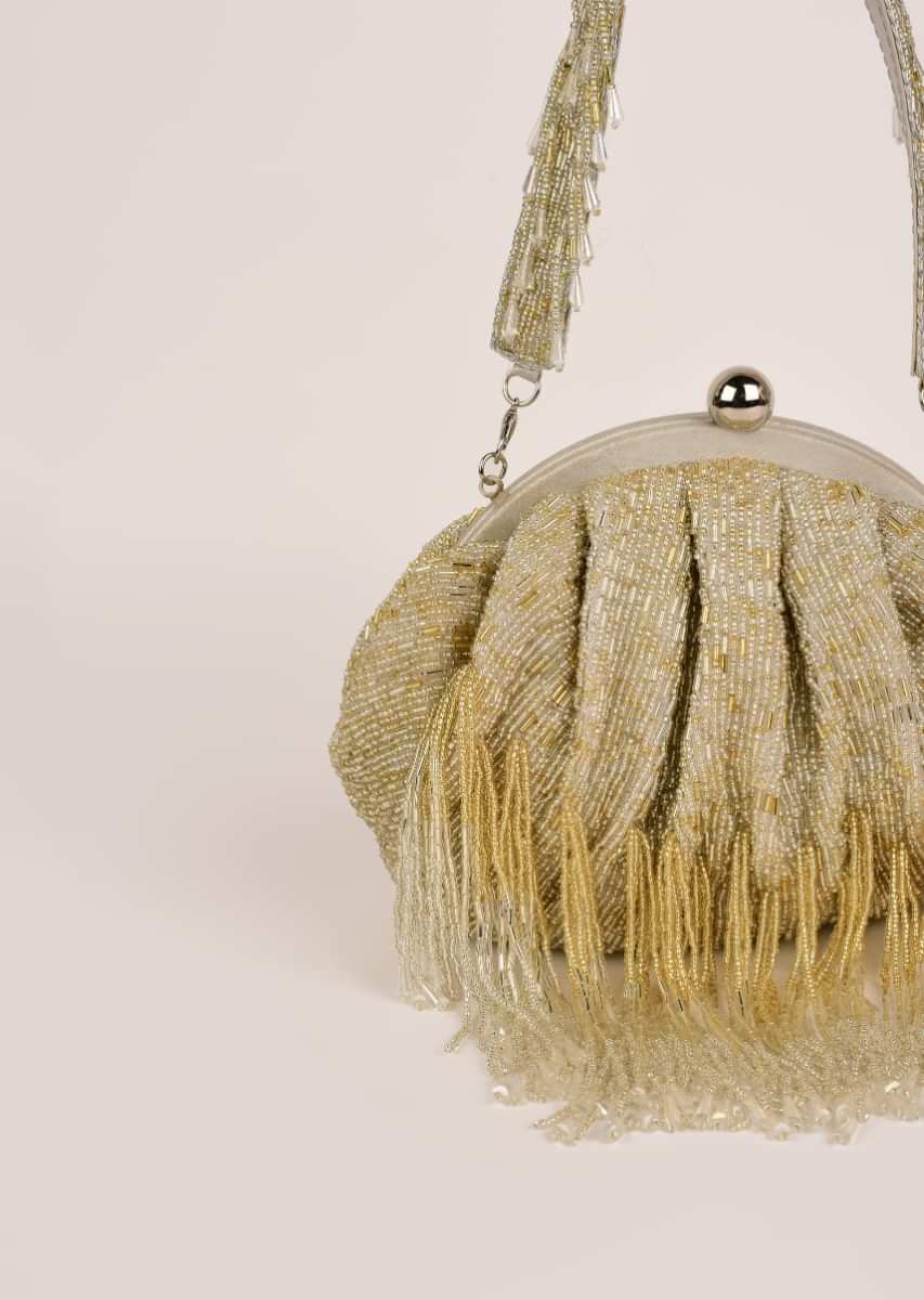 Gold And Silver Clutch Heavily Embroidered With Cut Dana And Beads All Over Along With Fringe Detailing Online - Kalki Fashion