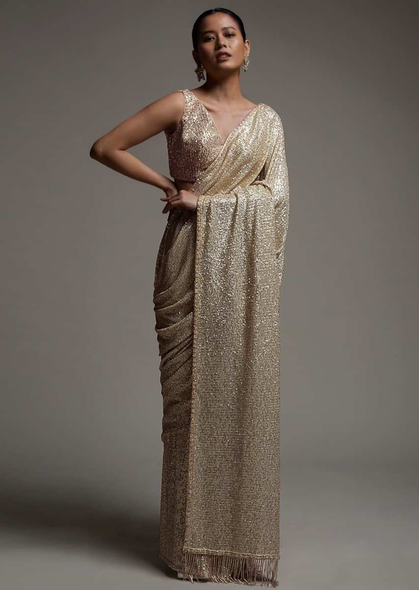 Details more than 79 golden sequin saree best