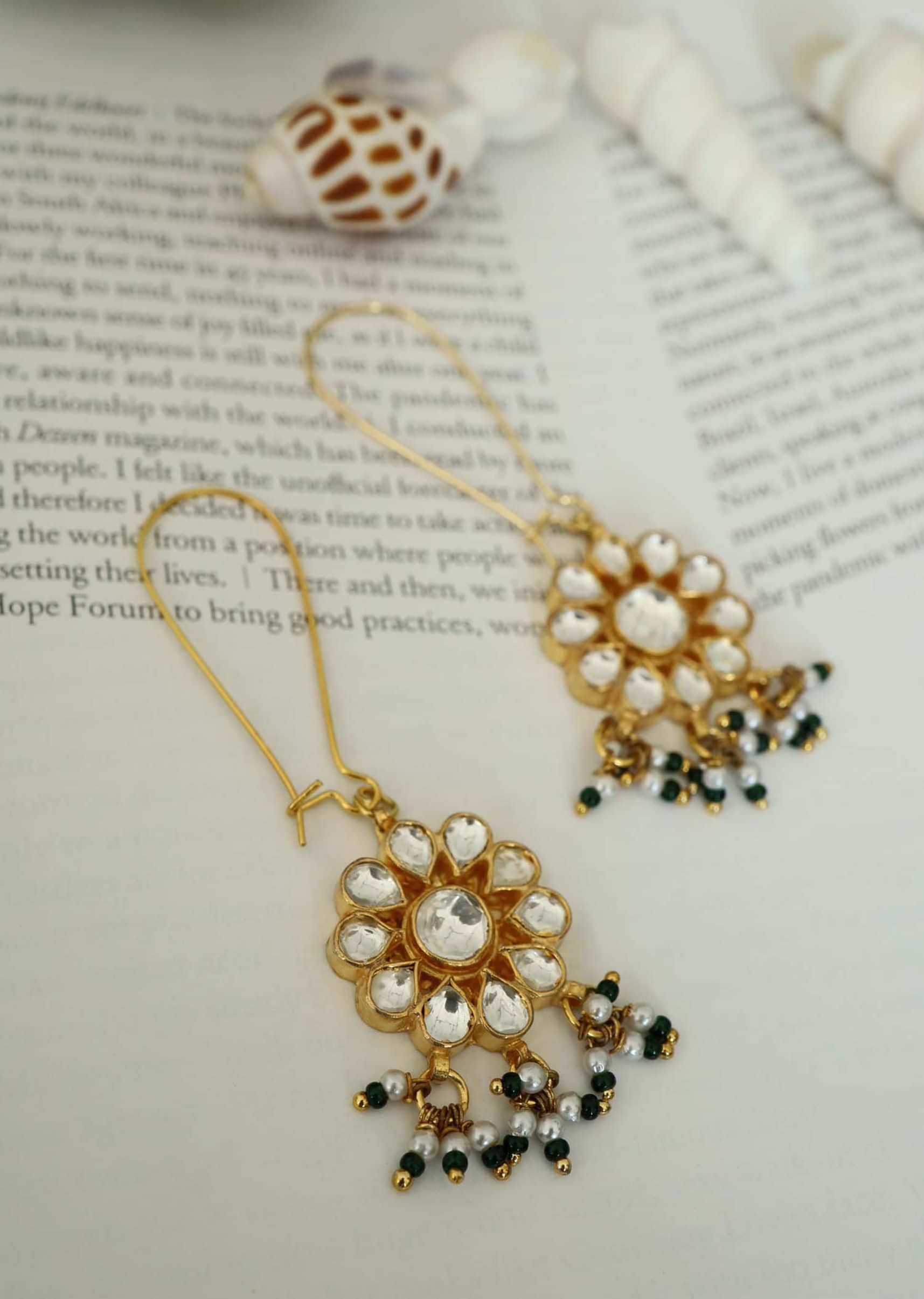 Gold Earrings In A Dainty Floral Design With Kundan Work And Pearl Trinkets