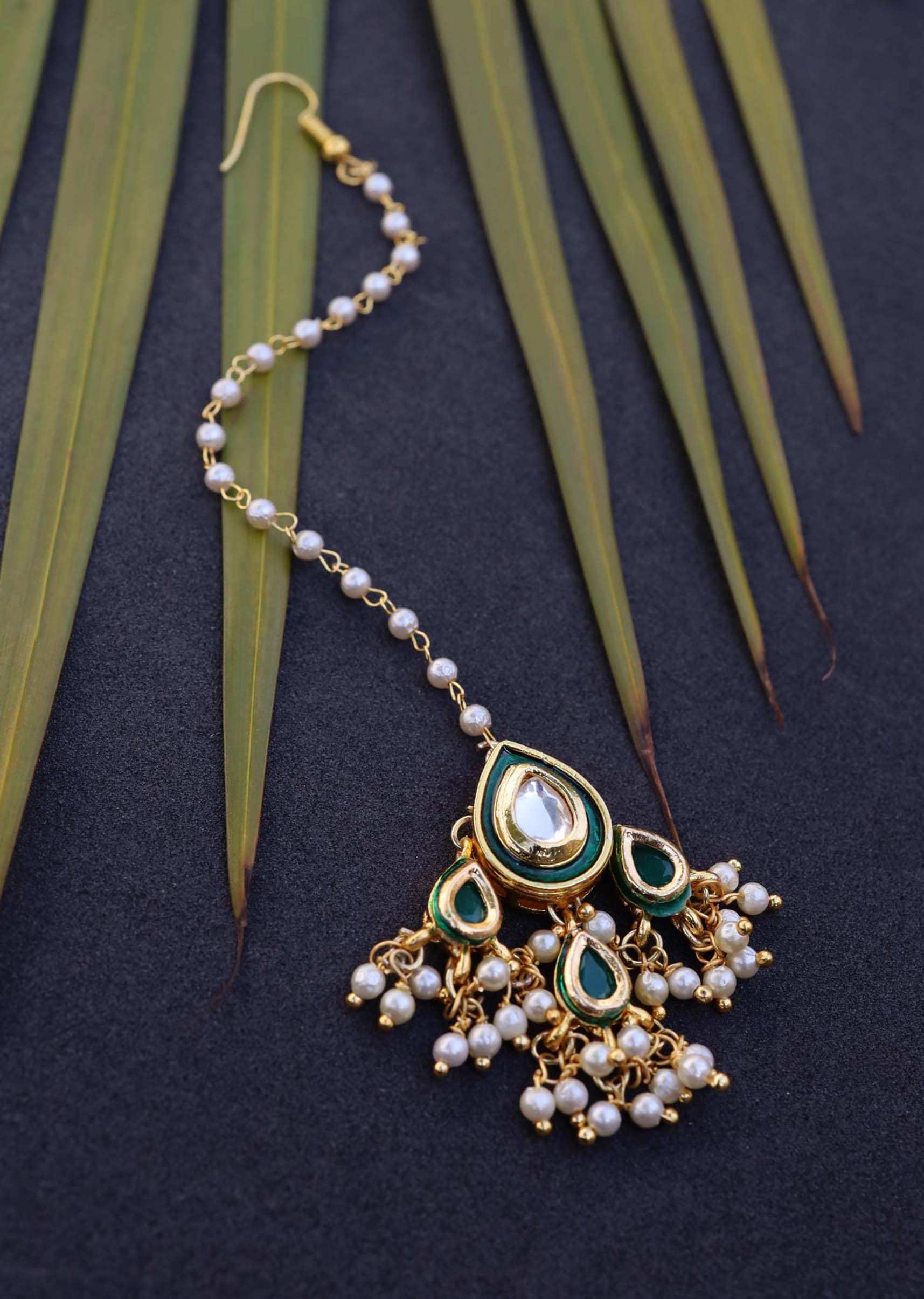 Gold Mangtika In A Classy Combination Of Green And Gold Kundan And Pearls