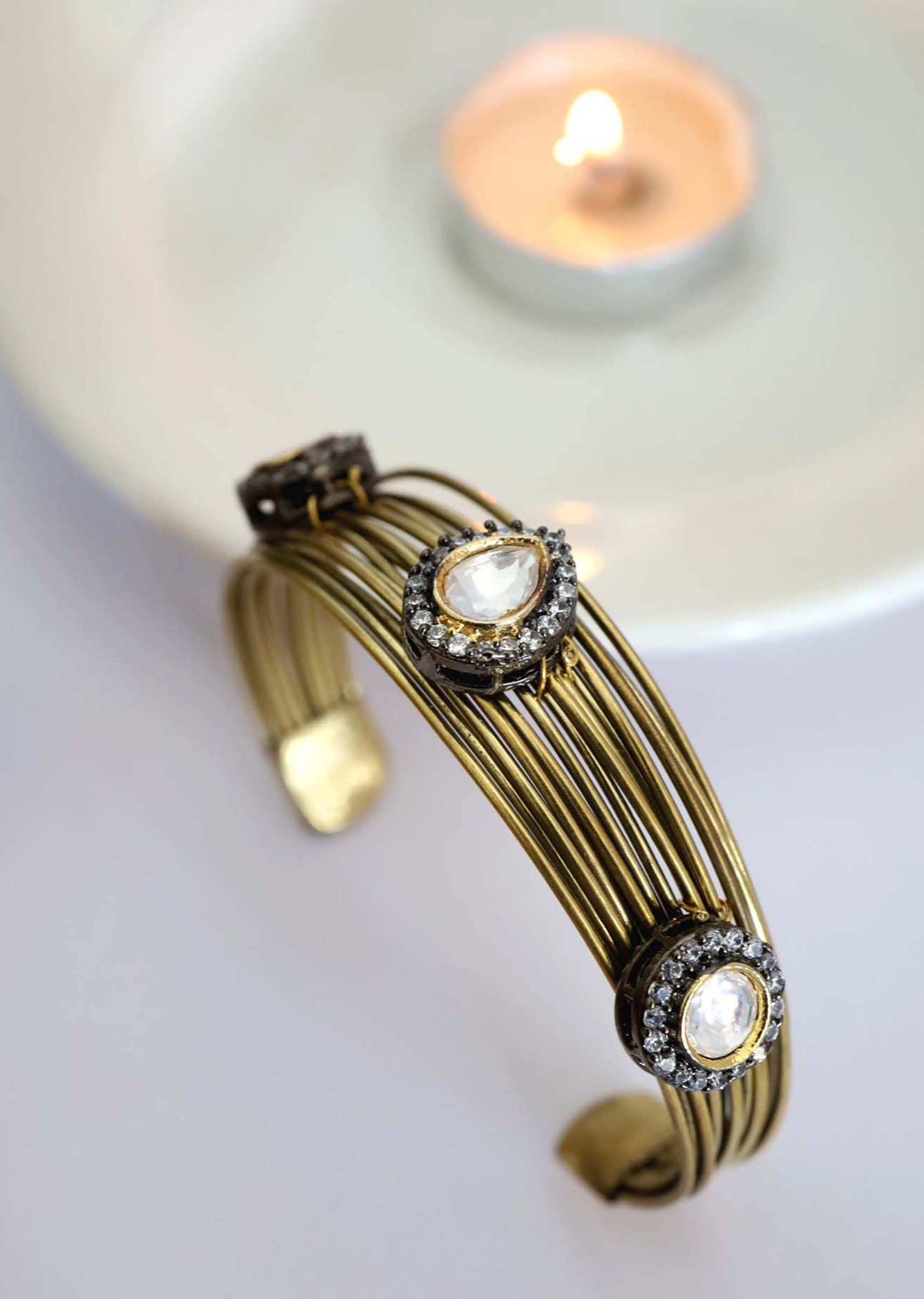 Gold Plated Bracelet With In An Edgy Style With Kundan Polki Work
