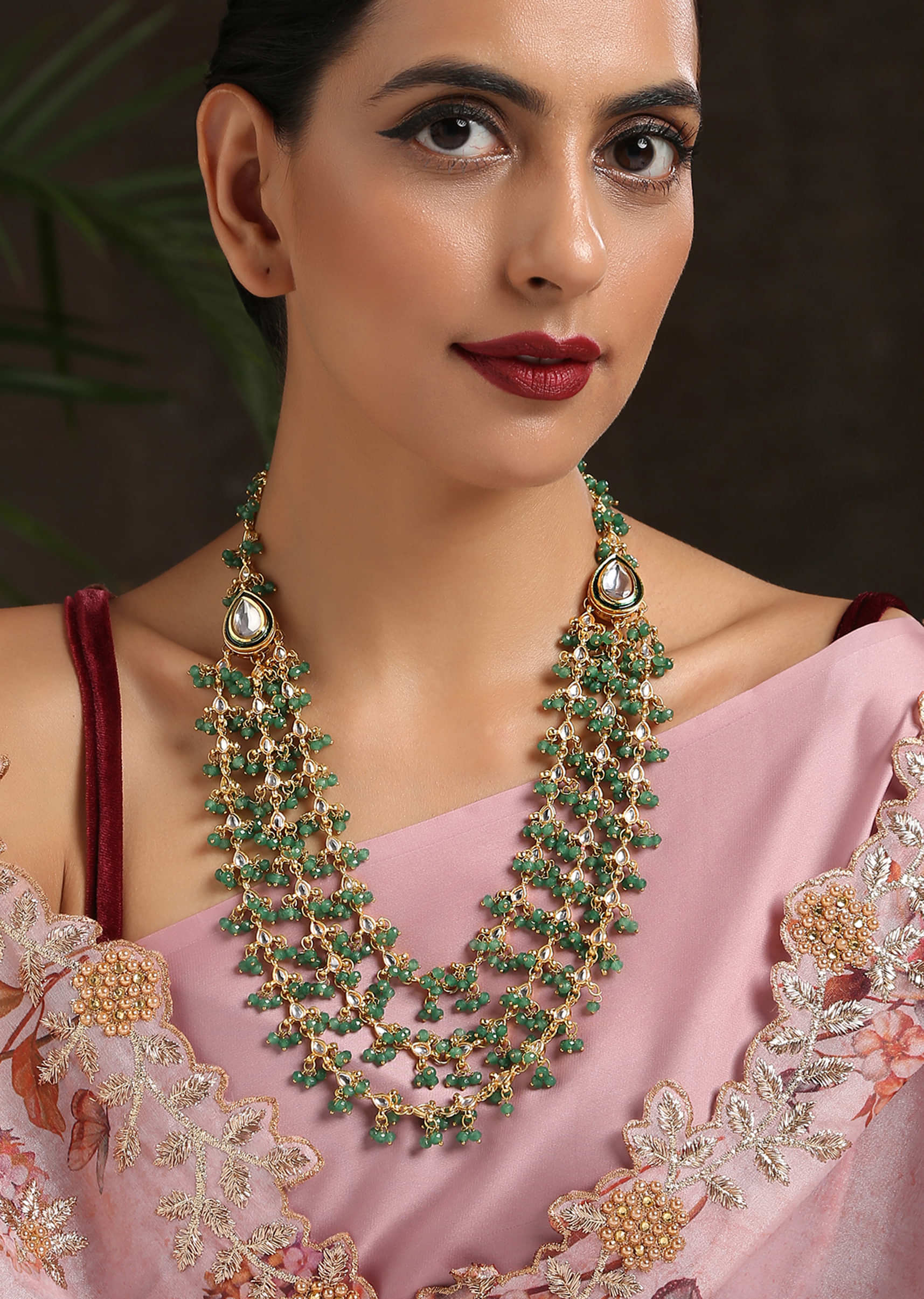 Gold Plated Sushma Necklace With Multiple Layers Of Kundan And Green Stones By Paisley Pop