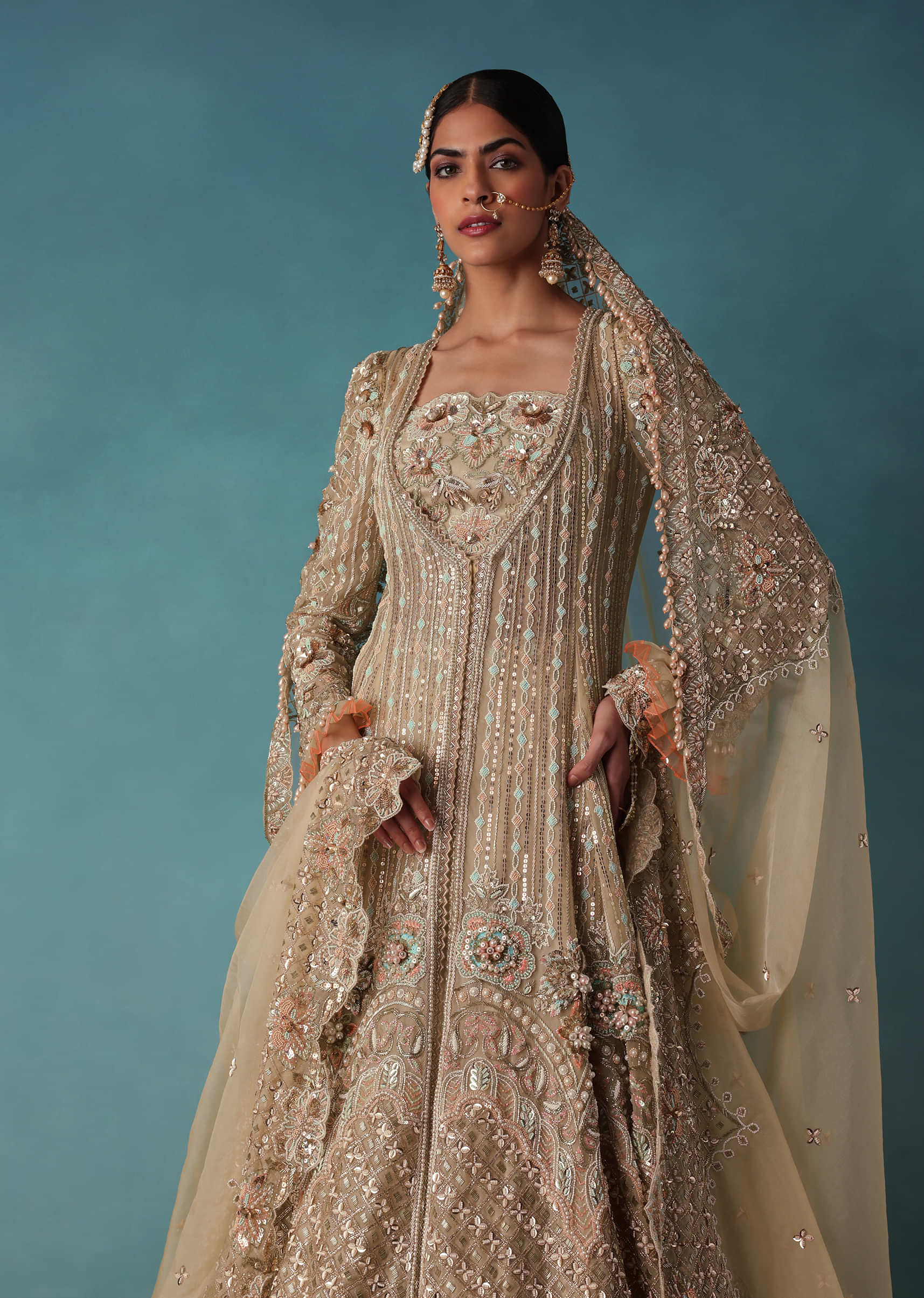 Gold Toned Embroidered Bridal Lehenga And Heavy Tube Top With Jacket
