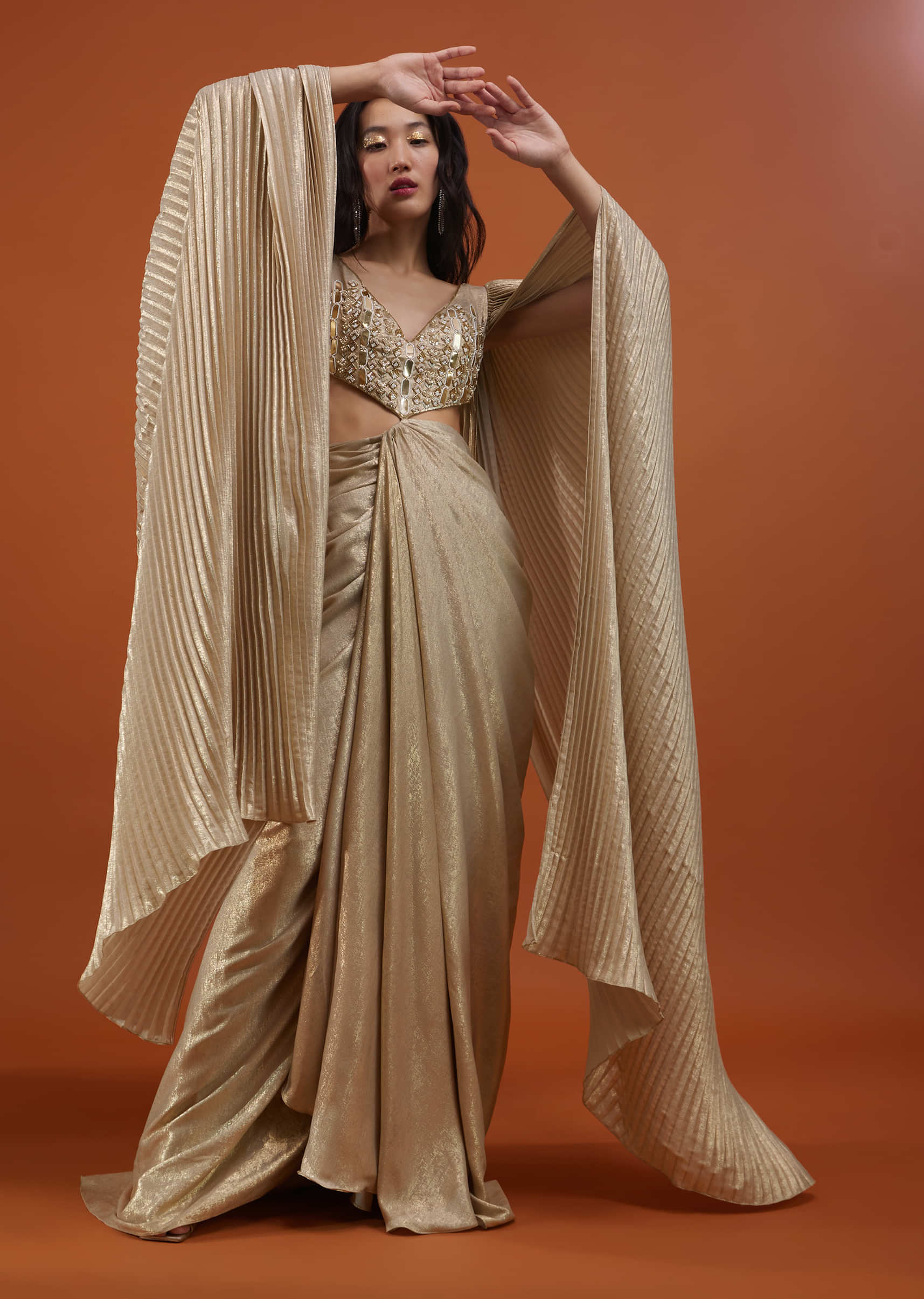 Kalki Gown With A Pre-Pleated Dhoti Skirt Area And Royal Cape Sleeves- NOOR 2022