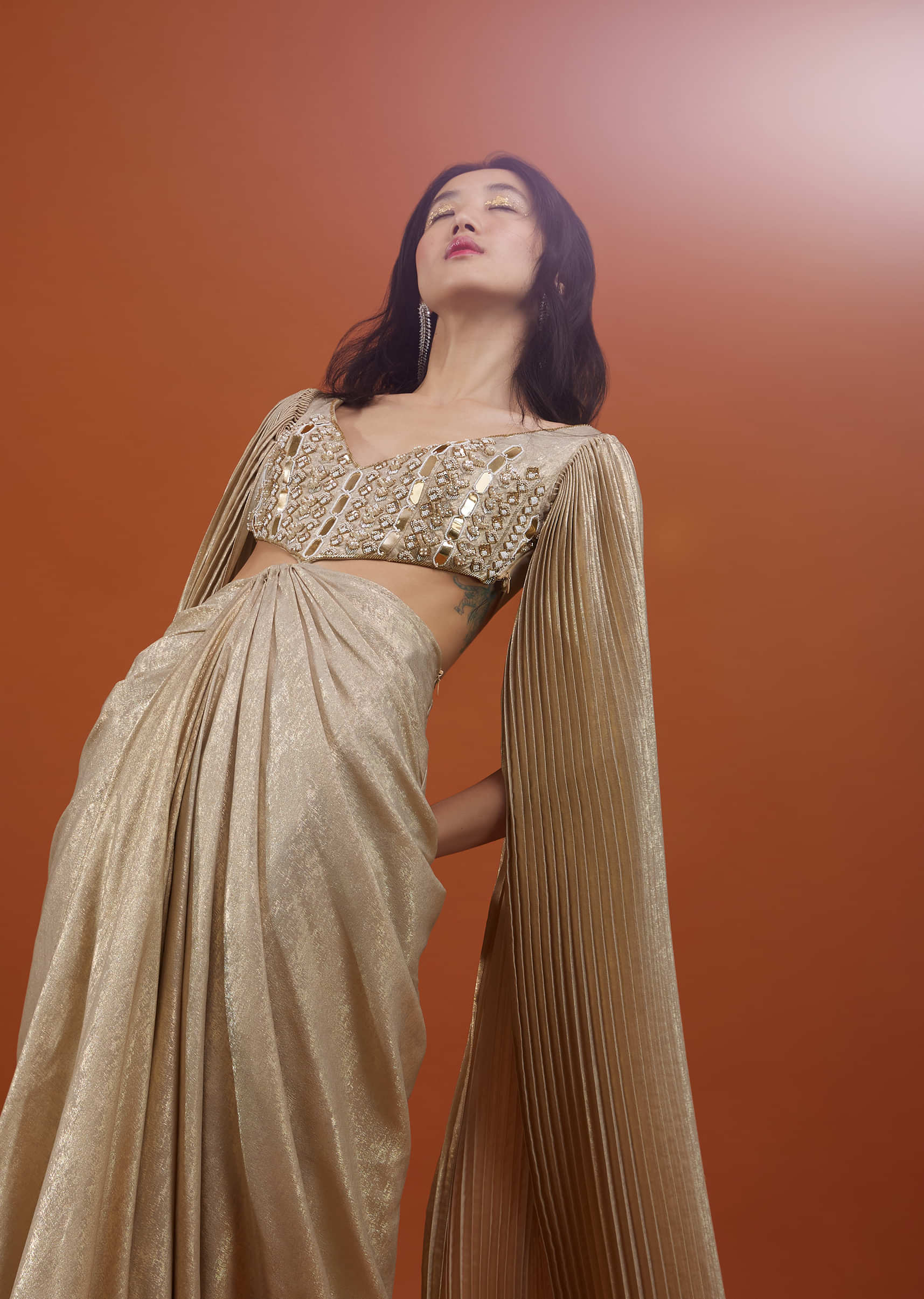 Mocha Brown Gown With A Pre-Pleated Dhoti Skirt Area And Royal Cape Sleeves- NOOR 2022