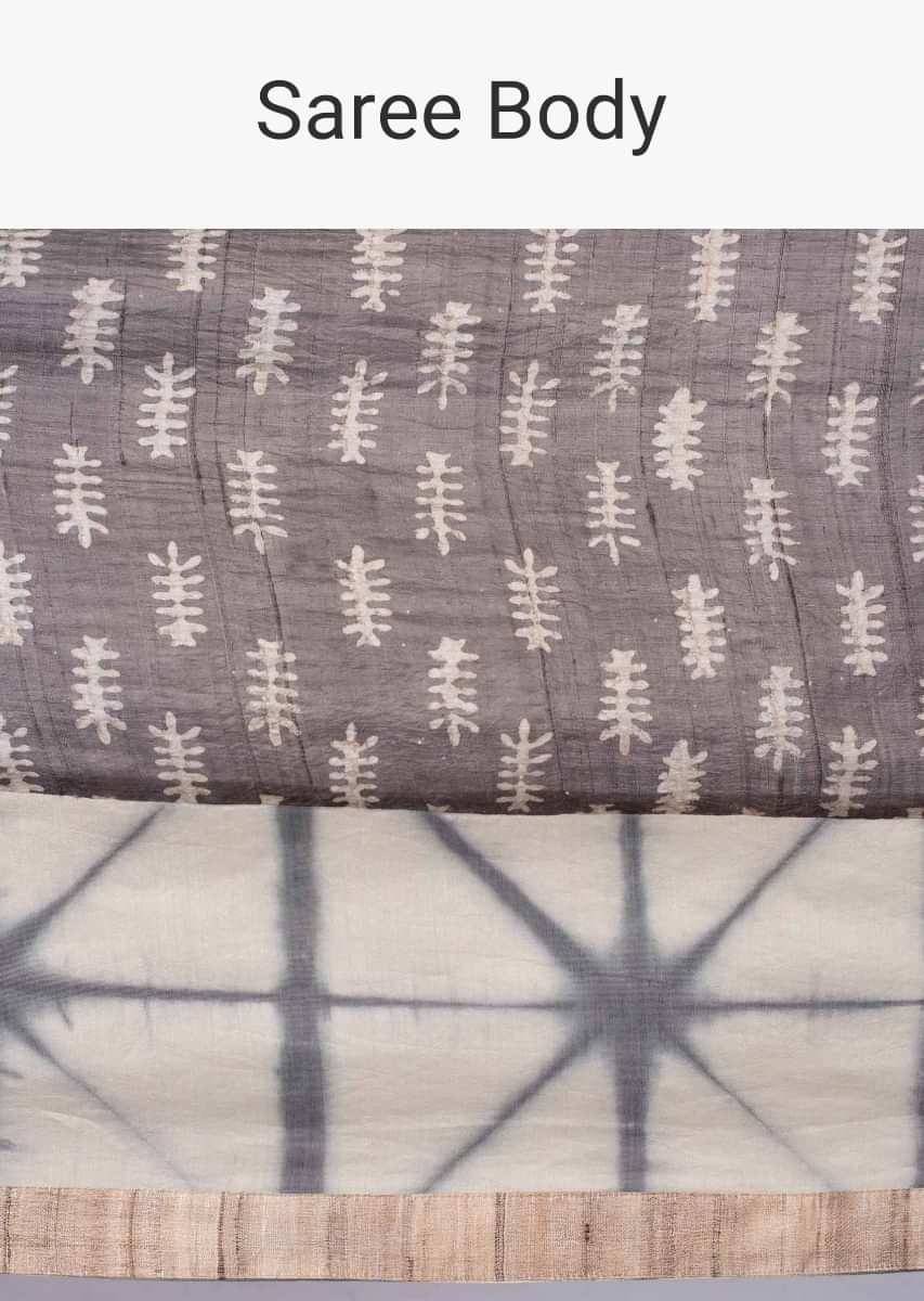 Graphite grey and luminary cream shaded batik print saree only on kalki