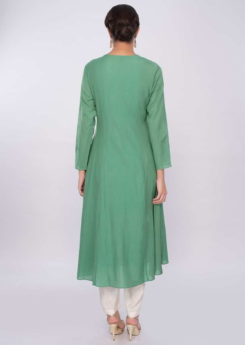 Green cotton kurti adorn with sequins work only on Kalki