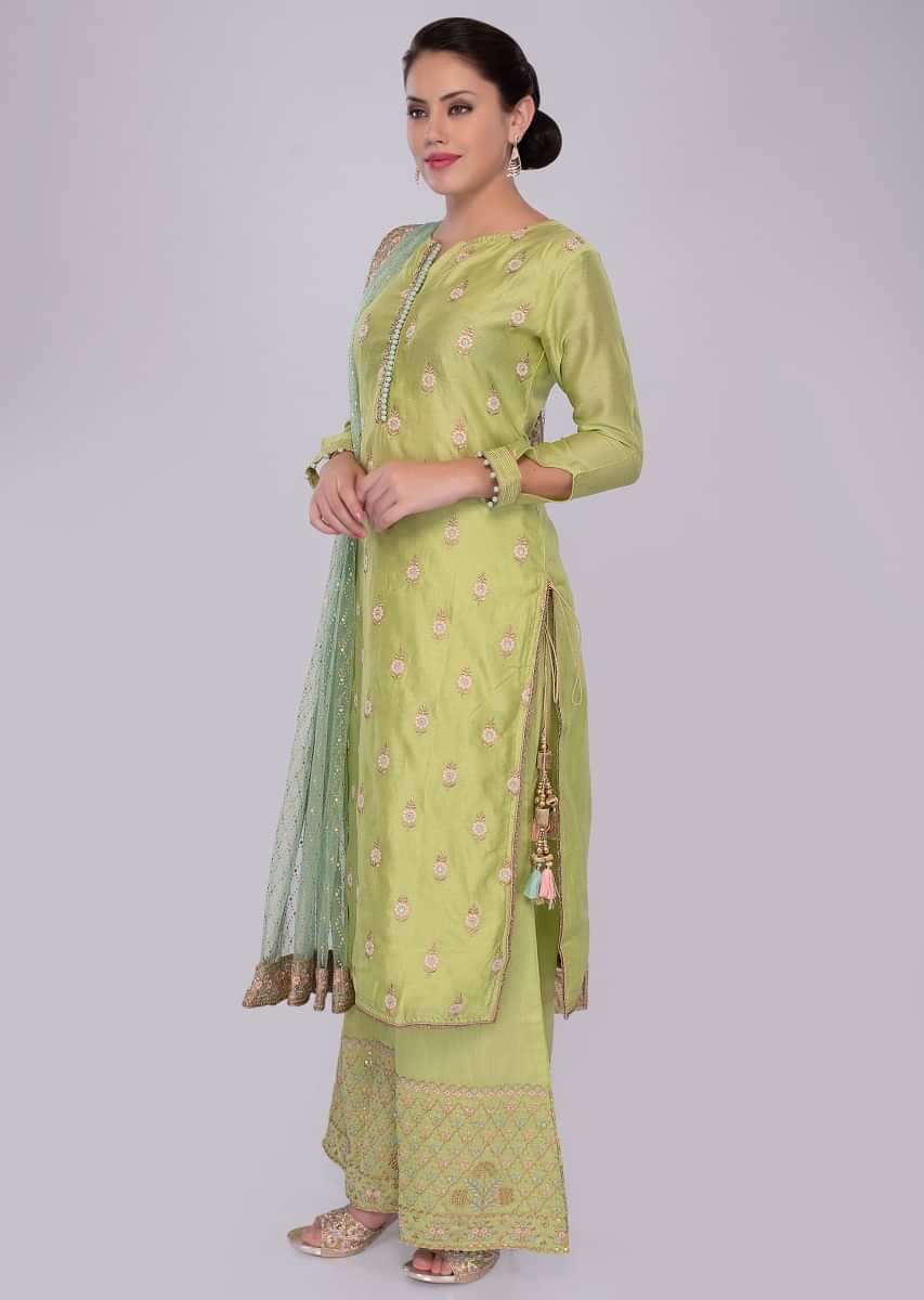 Green cotton silk palazzo suit set with net dupatta