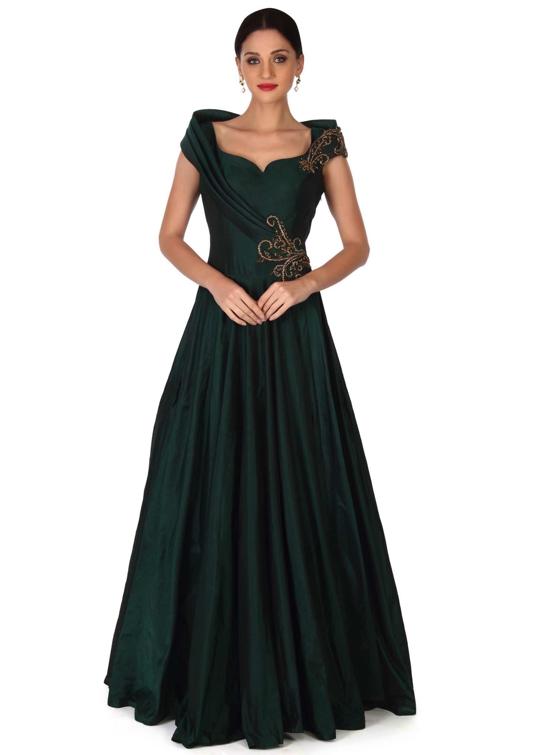 Green gown embellished in embroidered butti only on Kalki