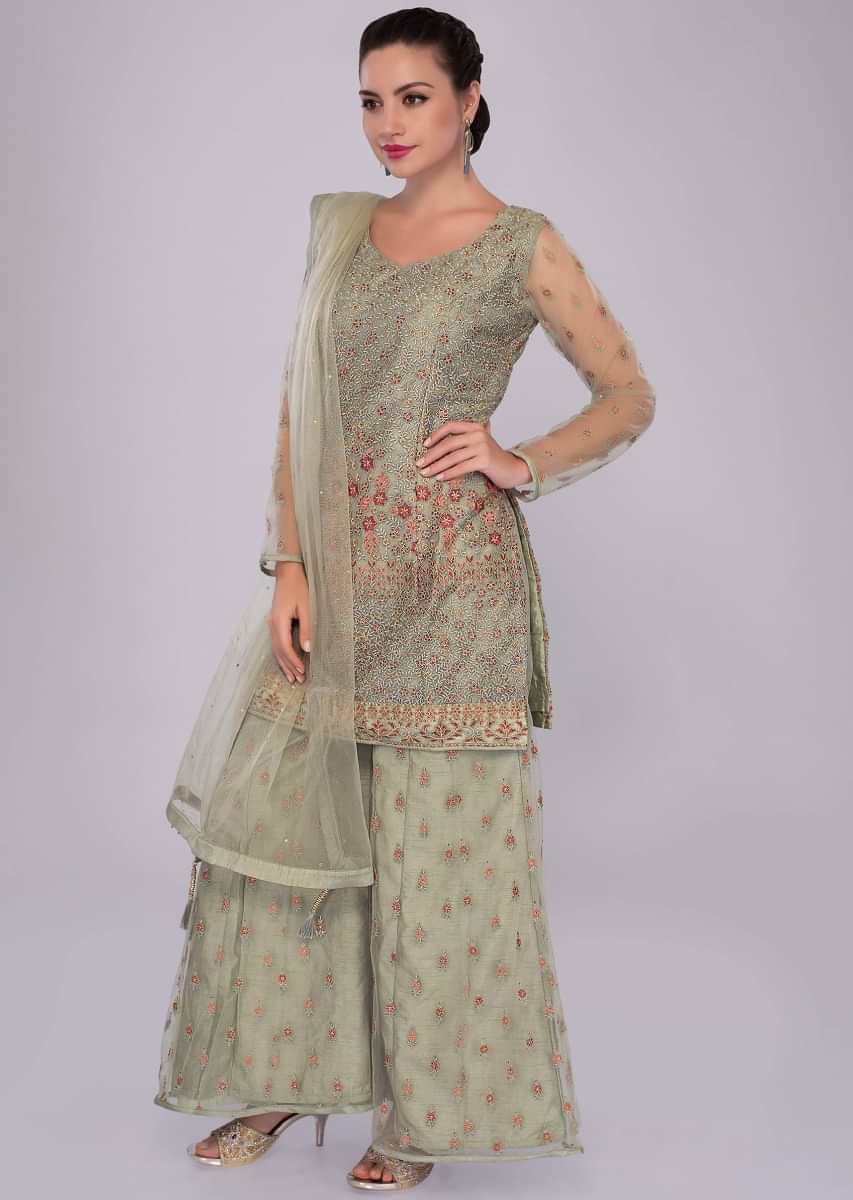Green net palazzo suit set in net jaal embroidery 