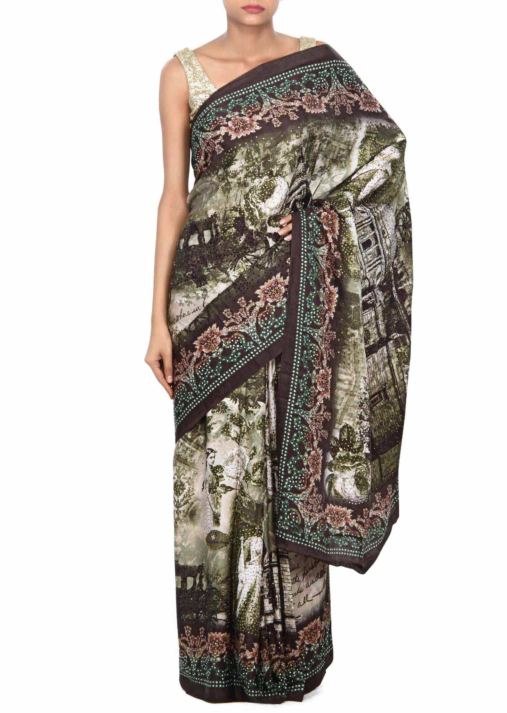 Mossy green saree enhanced in floral print only on Kalki