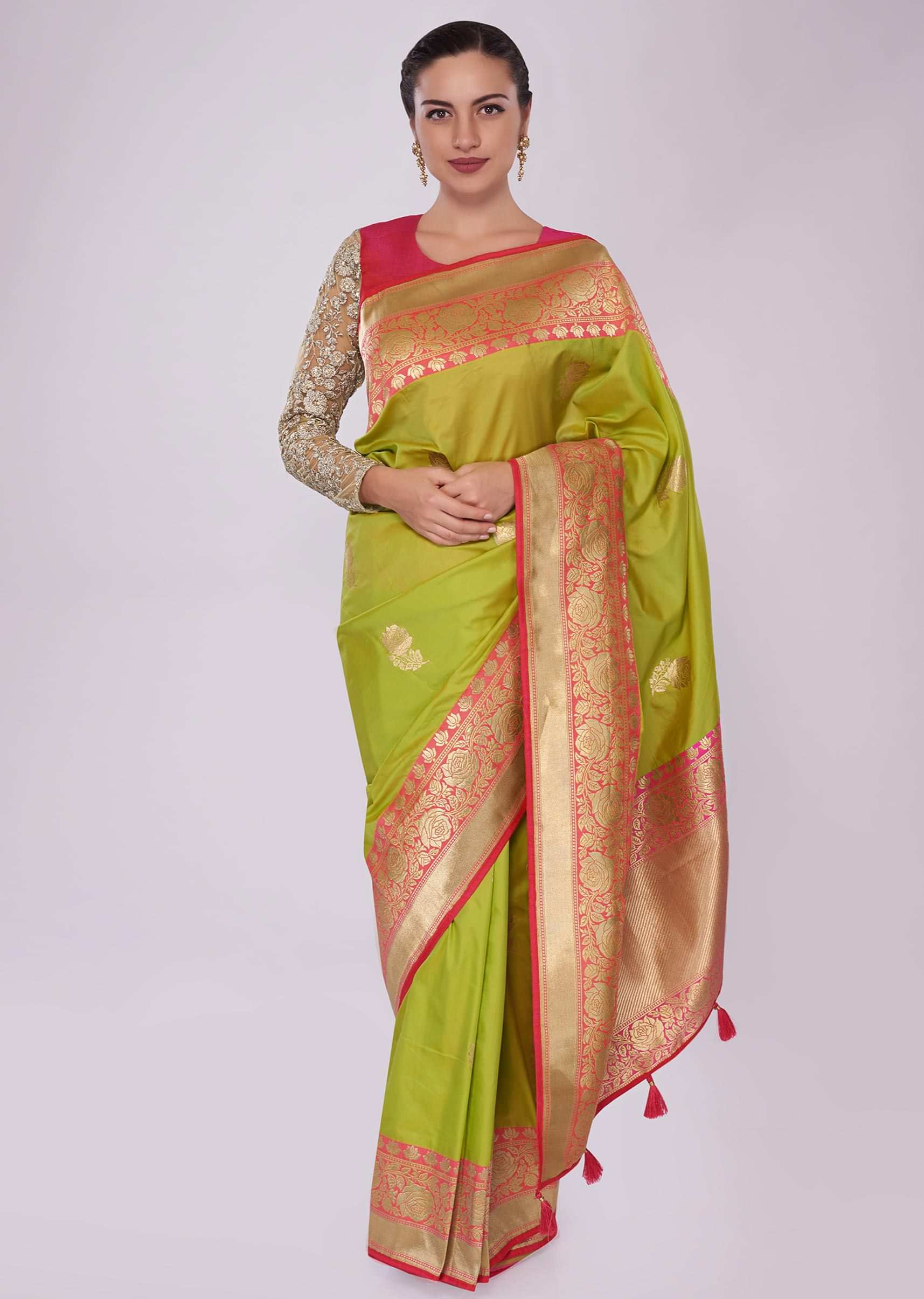 Green silk saree with weaved butti and brocade border