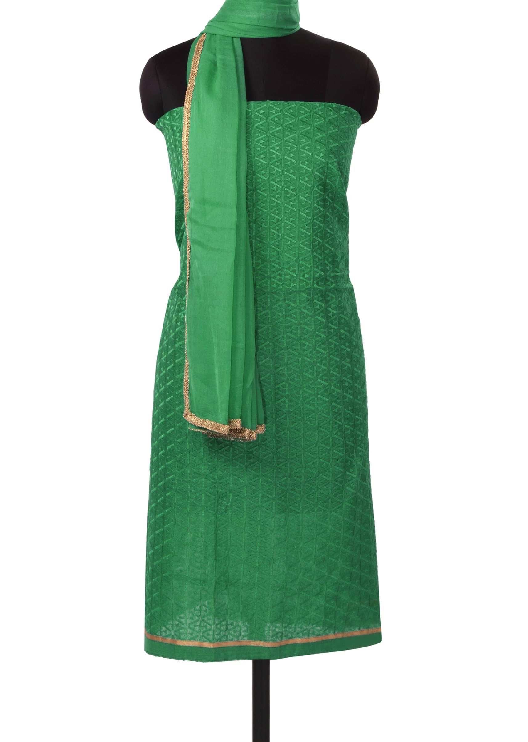 Green unstitched suit adorn in resham embroidery only on Kalki