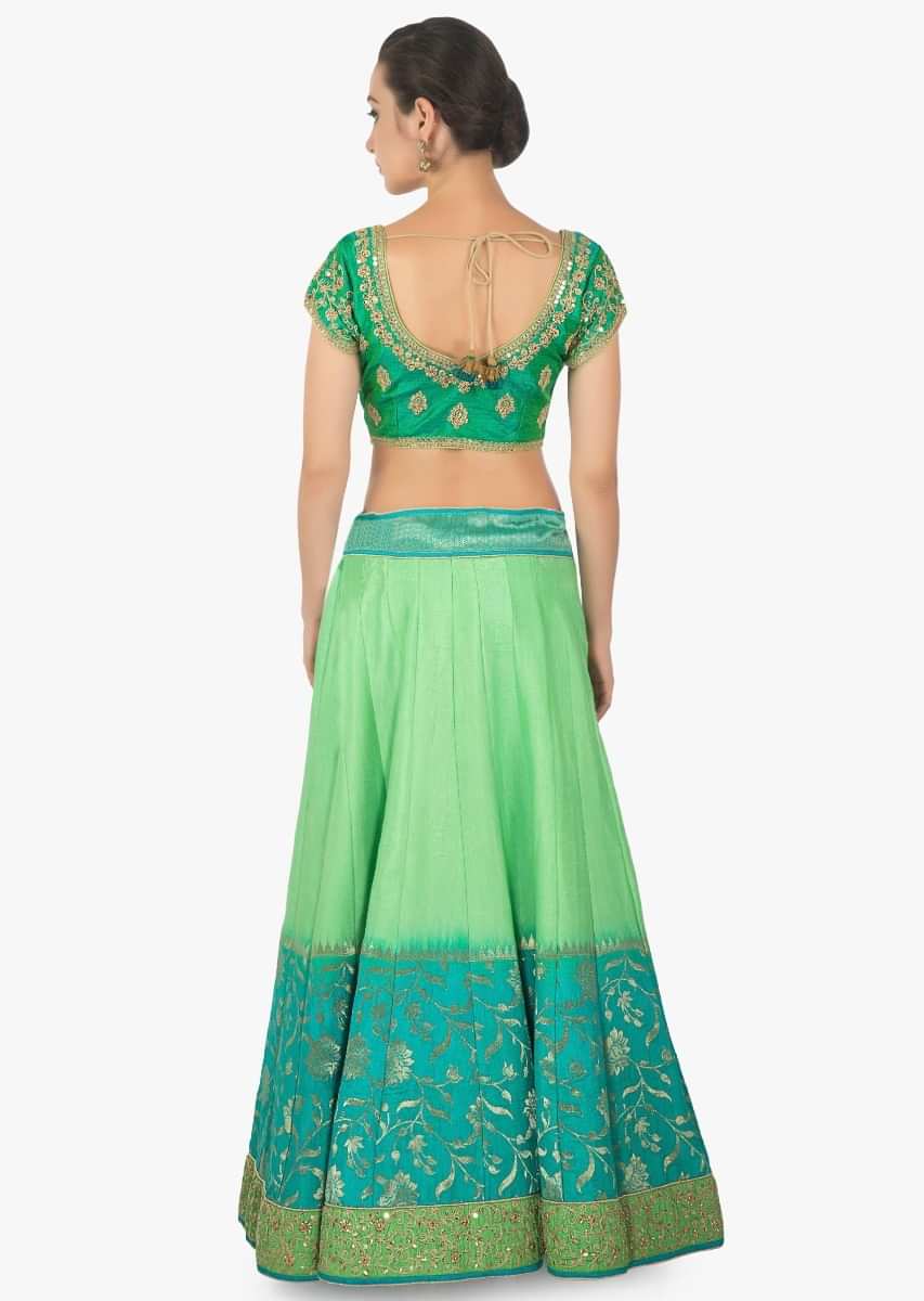 Green shaded lehenga matched with ready blouse