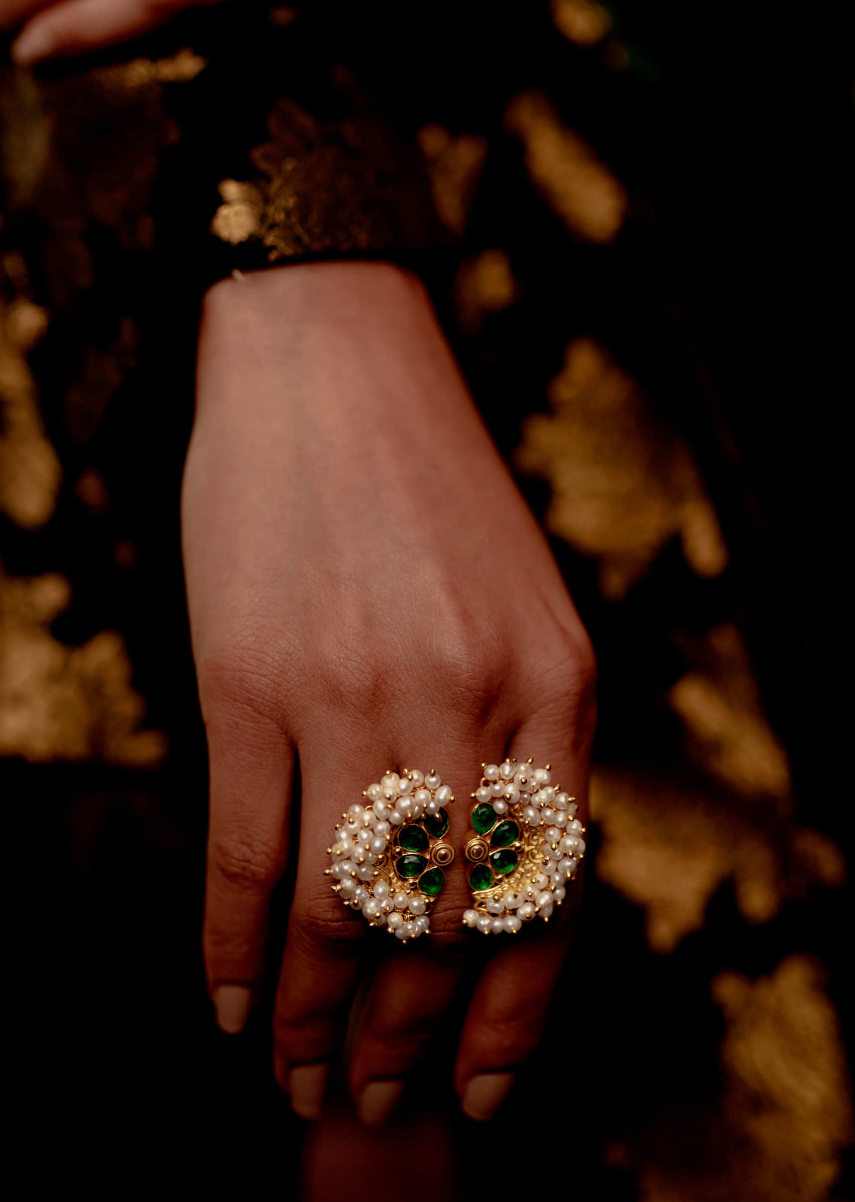 Green Cz Studded Gulmohar Ring With Delicate Filigree And Pearl Detailing By Zariin