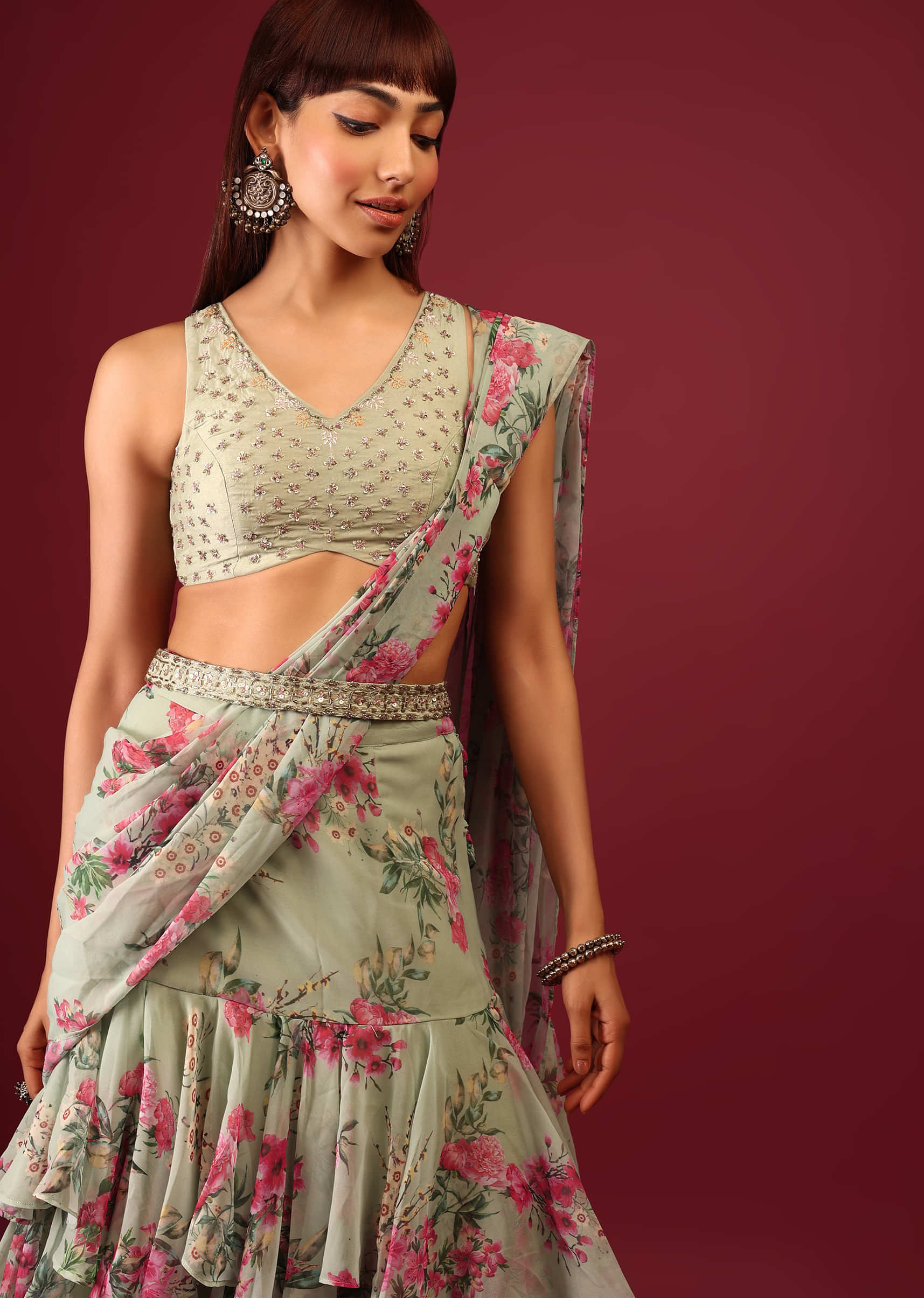 Mint Green Floral Print Pleated Lehenga Saree In Layered Frill Pattern With An Embellished Blouse
