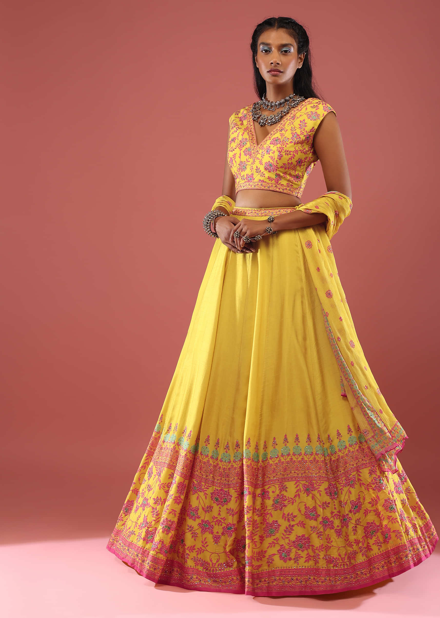 Canary Yellow Sleeveless Blouse With Colourful Stone Embellishments Paired With A Flowy Skirt