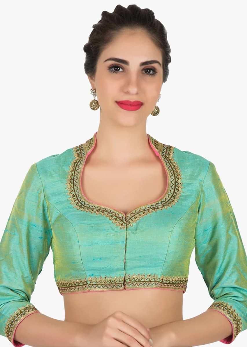 Green stitched blouse in raw silk featuring the zari embroidery work