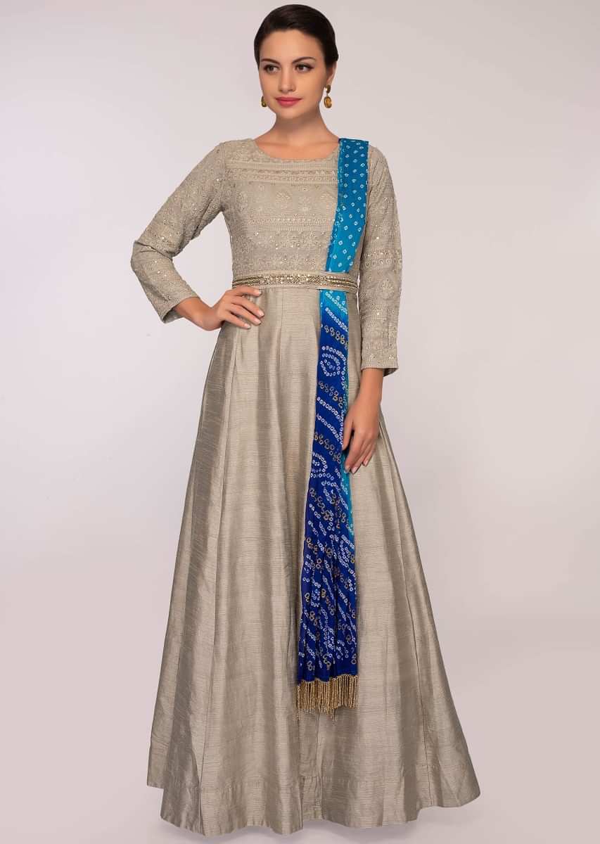 Grey anarkali dress paired with a blue shaded bandhani printed dupatta