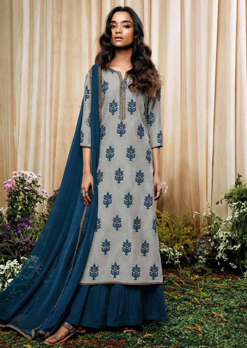 Grey blue unstitched suit in printed butti with zari embroidered placket