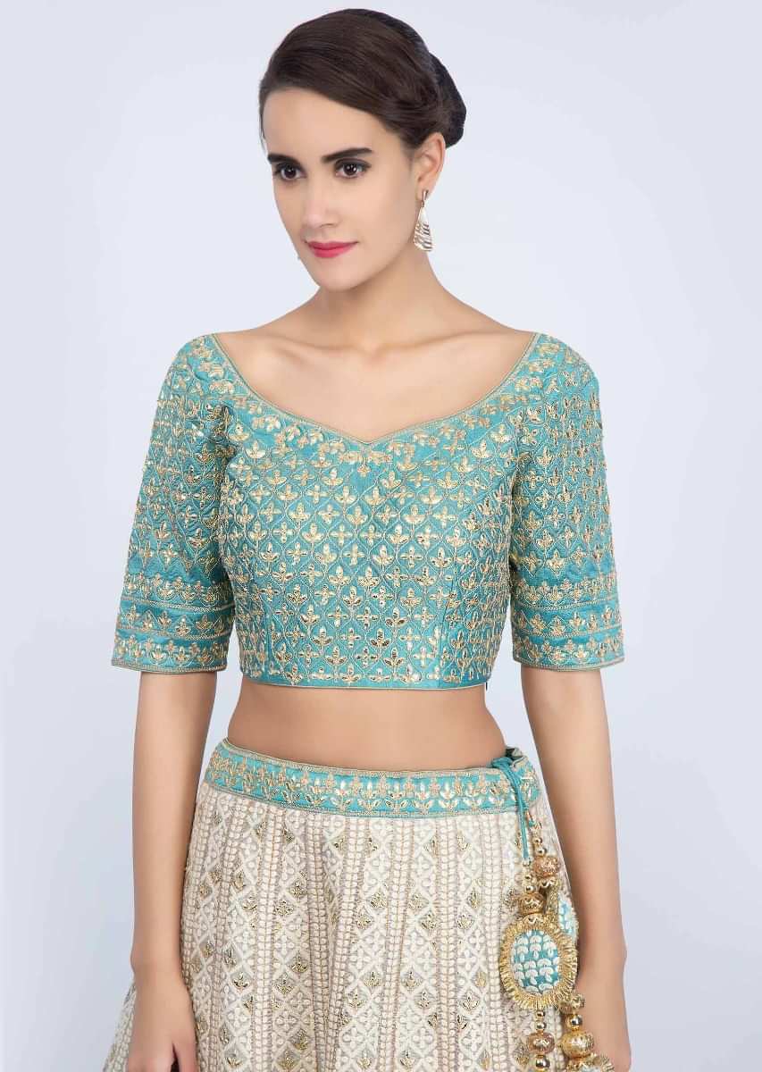 Grey jute cotton lehenga with blue silk gotta patch embroidered blouse only on Kalki