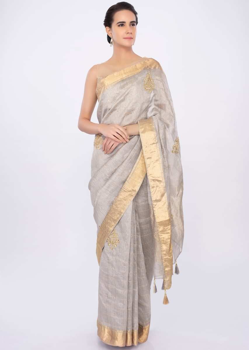 Grey linen checks saree with embroidered butti only on kalki