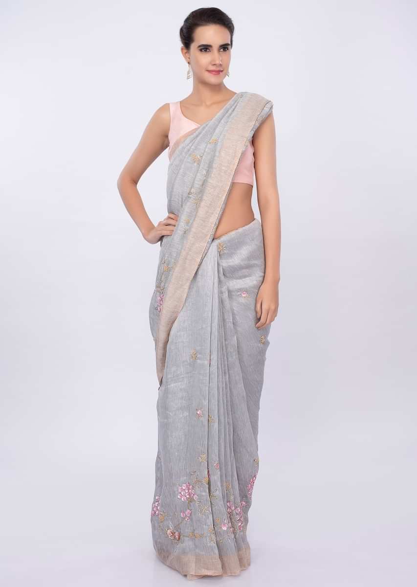 Grey linen saree with embroidered butti and border only on Kalki