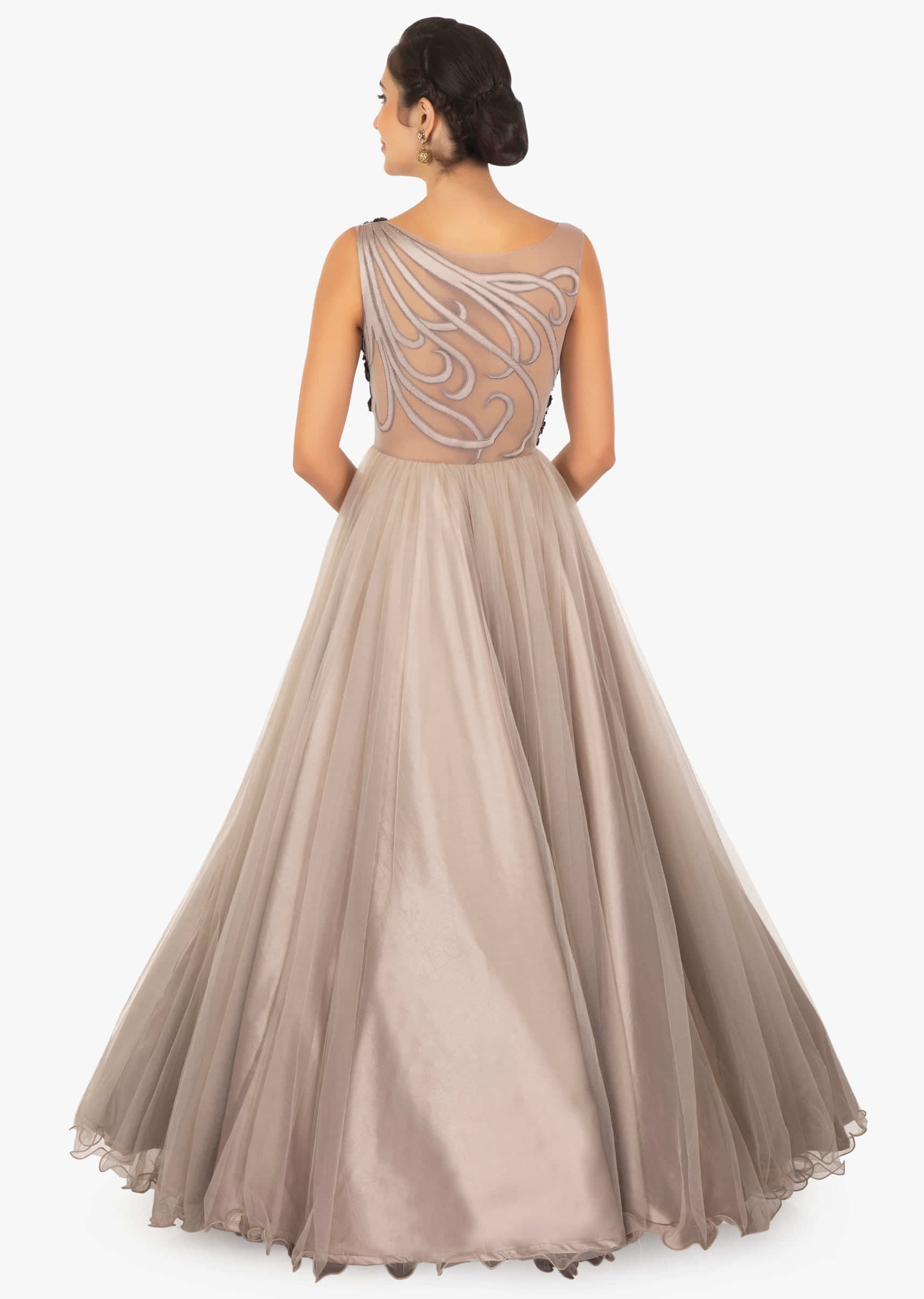 Grey net gown embossed in sequins, cut dana and French knot on the bodice only on Kalki