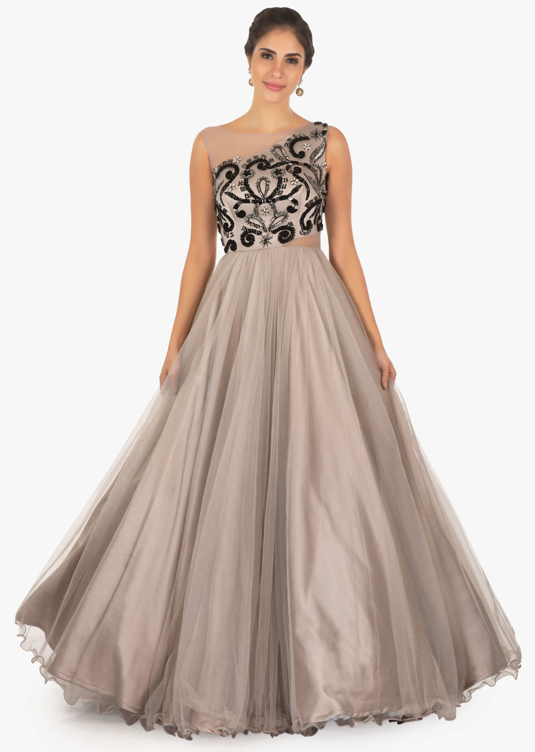 Grey net gown embossed in sequins, cut dana and French knot on the bodice only on Kalki