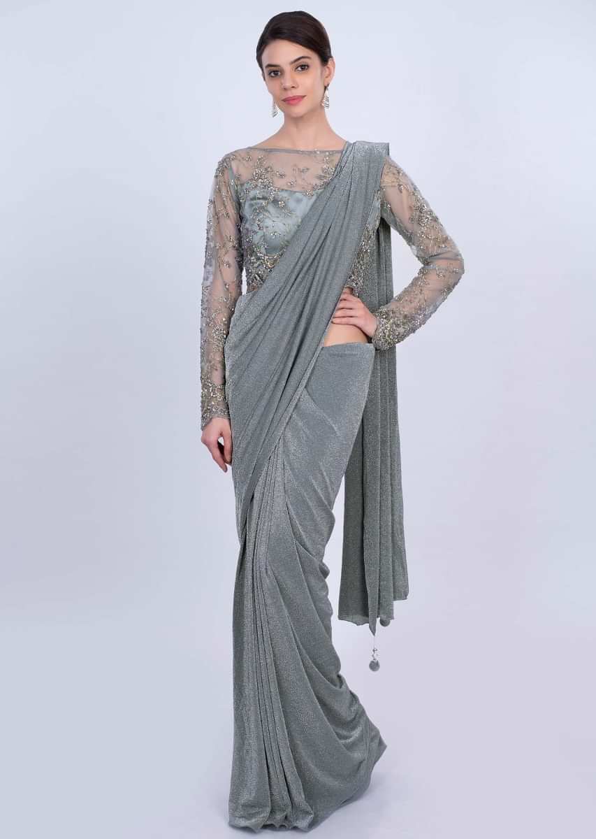 Grey shimmer lycra saree with matching net embroidered blouse only on Kalki