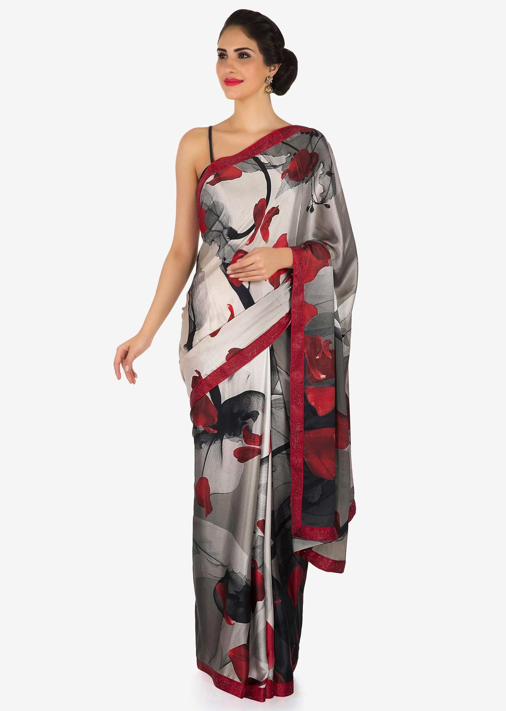 Grey and off white saree in crepe satin with leaf motif and red border only on Kalki