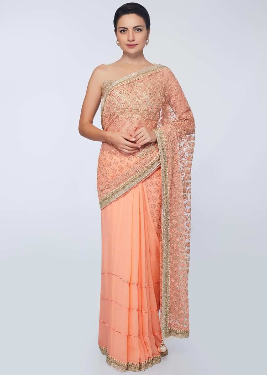 Half and half peach saree featuring in net and chiffon with crochet stripes along with embroidery and butti 