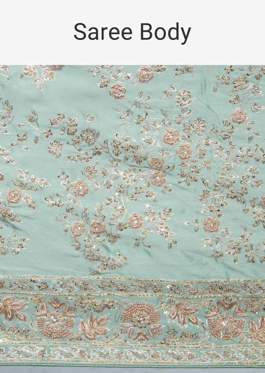 Heavy embroidered pista green satin saree  only on kalki