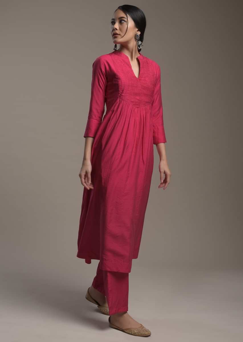 Hot Pink A Line Suit In Cotton With Pin Tucks Detailing And Teamed With A Zari Embroidered Organza Dupatta  