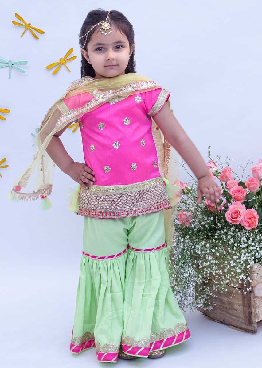 Kalki Girls Hot Pink And Pista Green Sharara Suit In Dupion Silk With Floral Embroidered Buttis By Fayon Kids