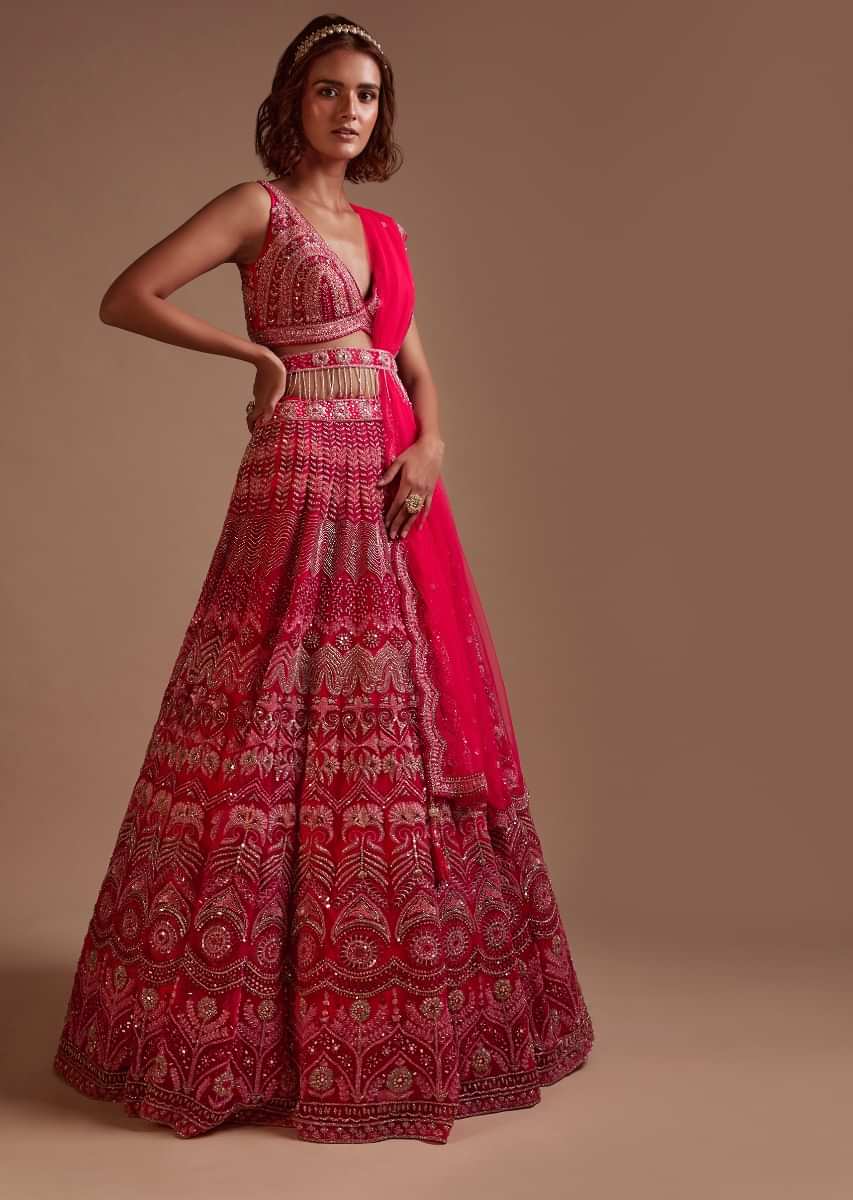 Hot Pink Lehenga Choli In Net With Mirror Work In Floral And Mughal Motifs Along With A Tassel Belt 