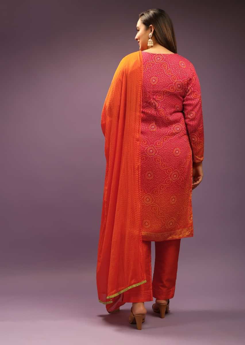 Fire Orange Shaded Straight Cut Chiffon Suit With Tassels On The Hem And Bandhani Pattern Throughout