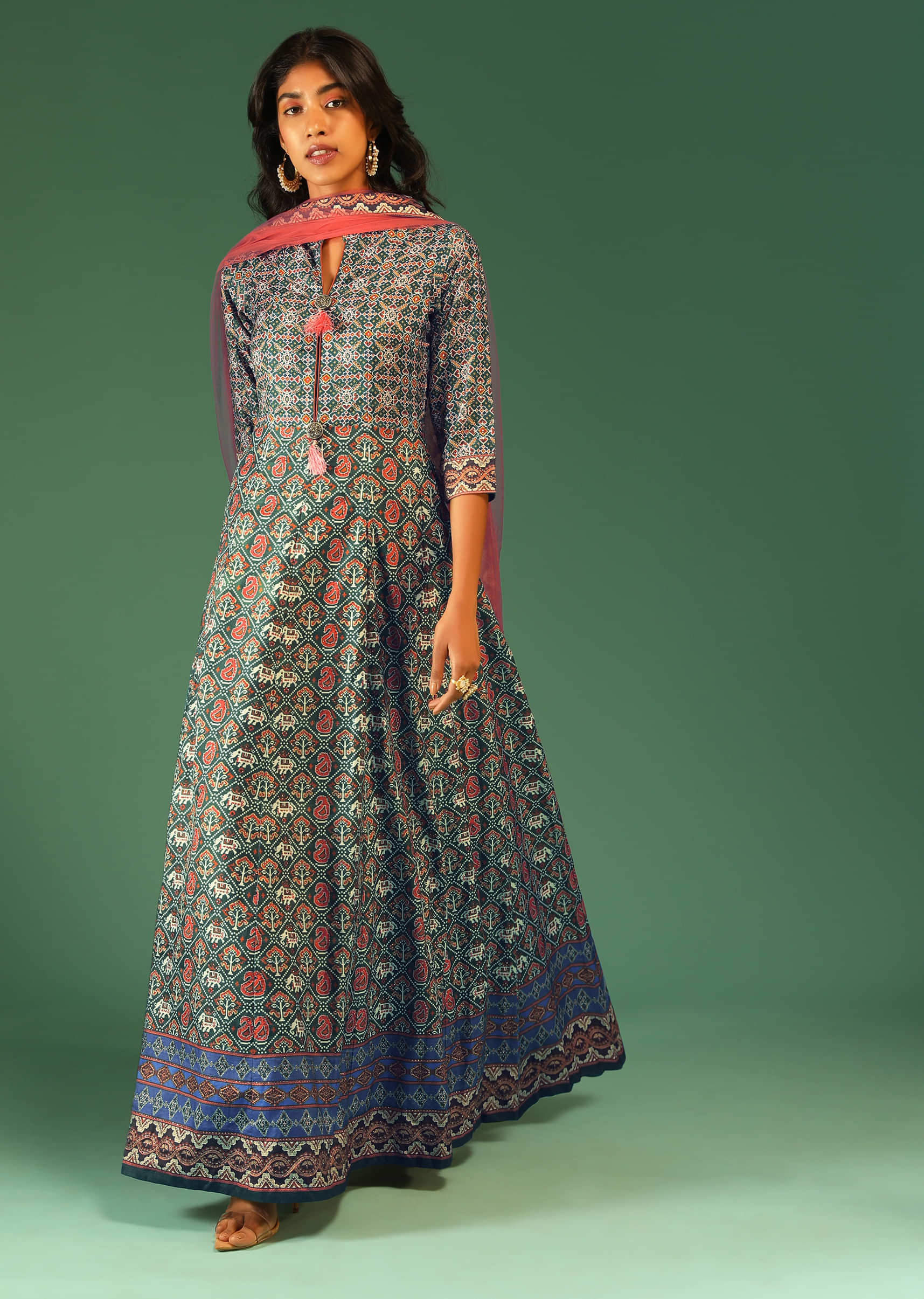 Hunter Green Anarkali Suit In Raw Silk With Patola Print And Kundan Detailing Along With A Pink Net Dupatta  