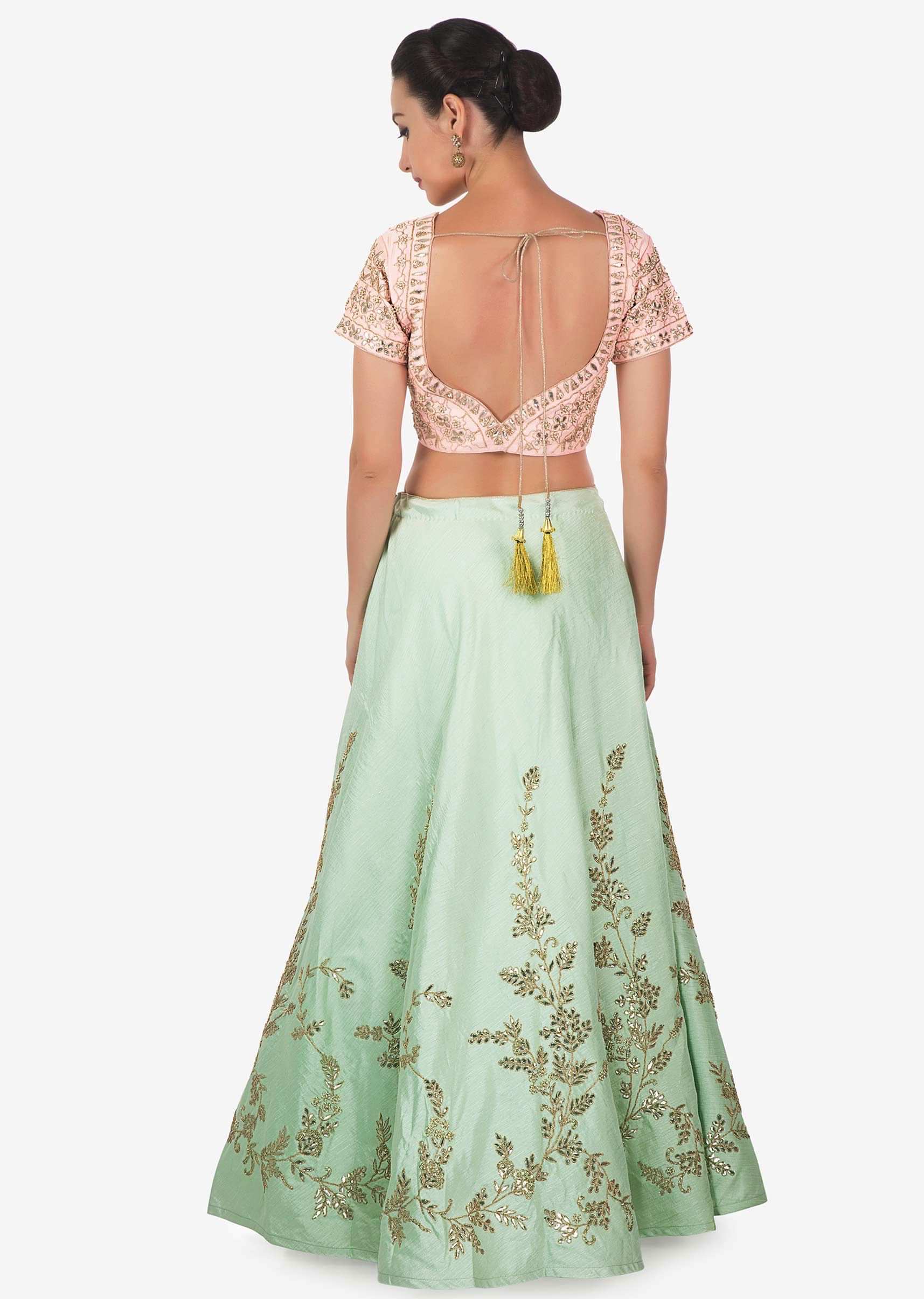 Ice blue lehenga with pink embroidered blouse adorn in gotta patch and moti work only on Kalki