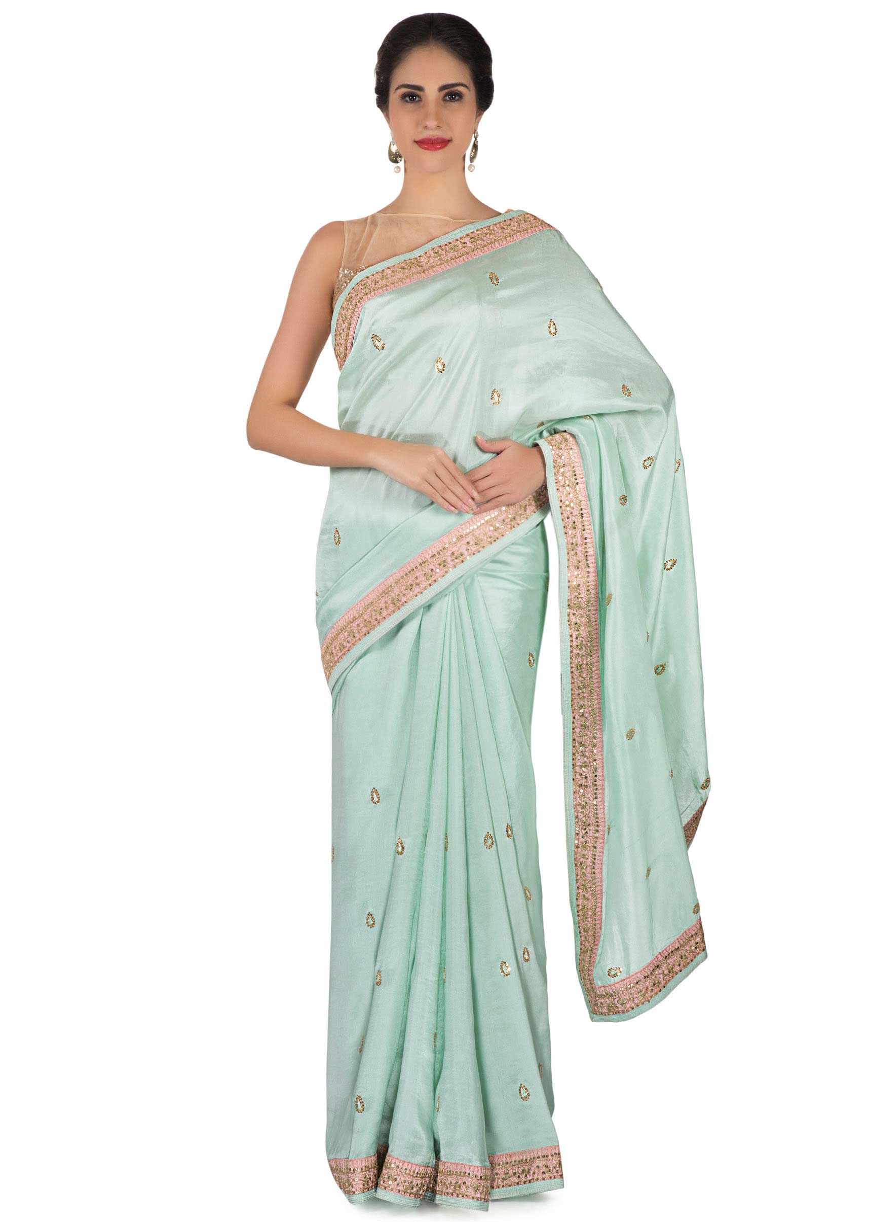 Ice blue saree in satin crepe in sequin butti and border only on Kalki