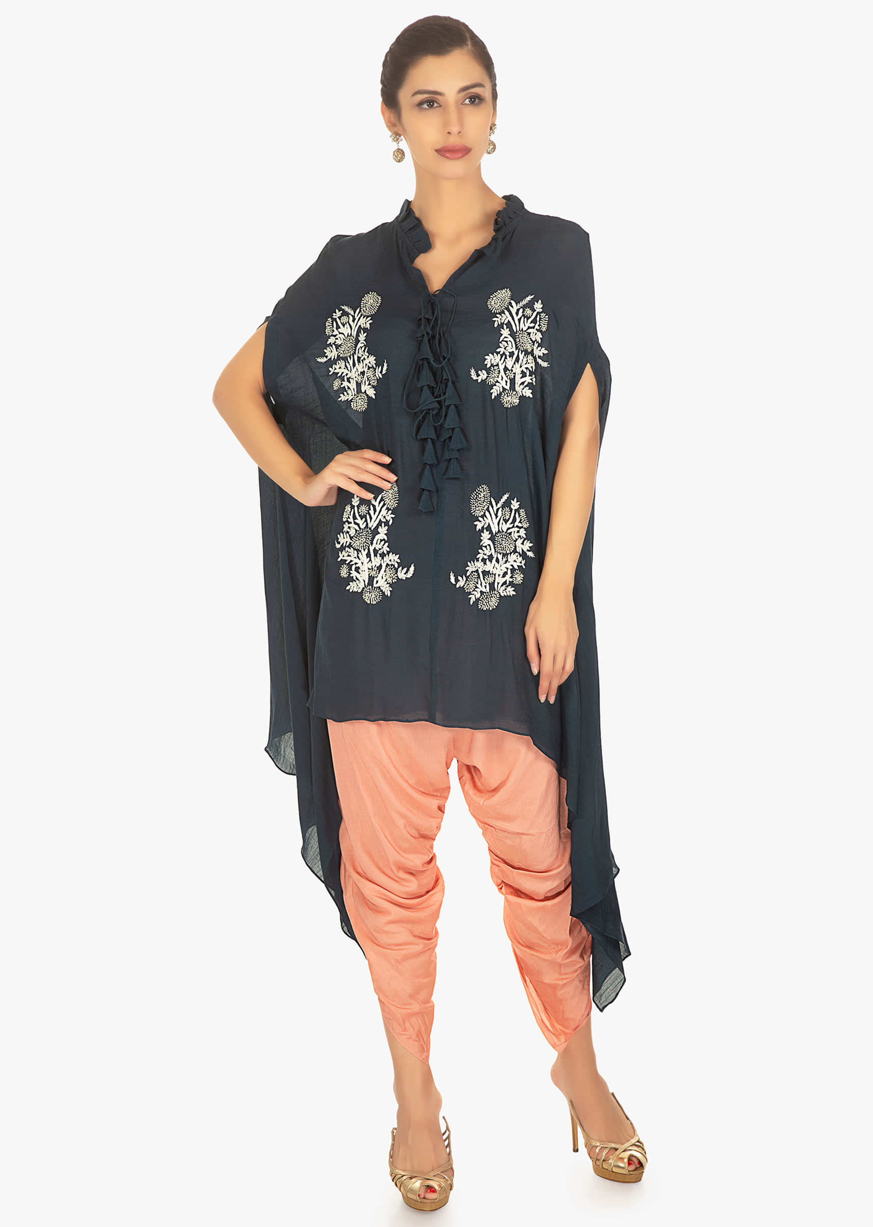 Indigo blue thread embroidery cotton top paired with peach dhotti 