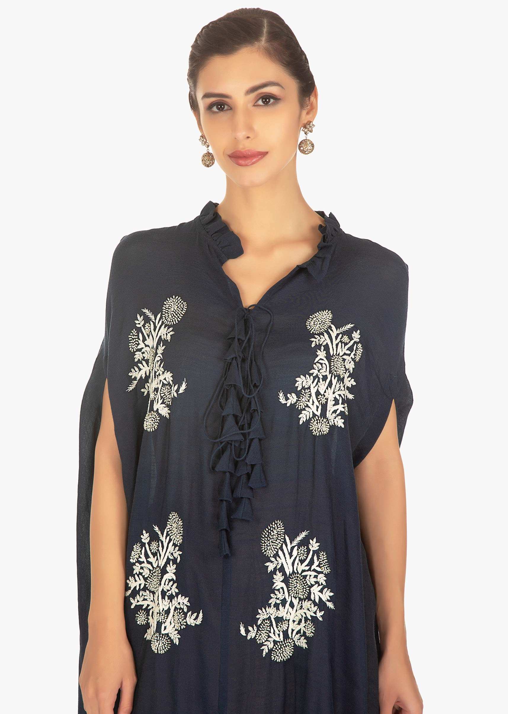 Indigo blue thread embroidery cotton top paired with peach dhotti 