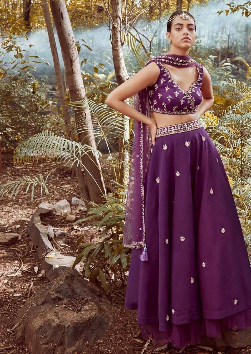 Irish Purple Lehenga Choli In Raw Silk With Cut Dana And Beads Embroidered Floral Buttis And Overlapping V Neckline 