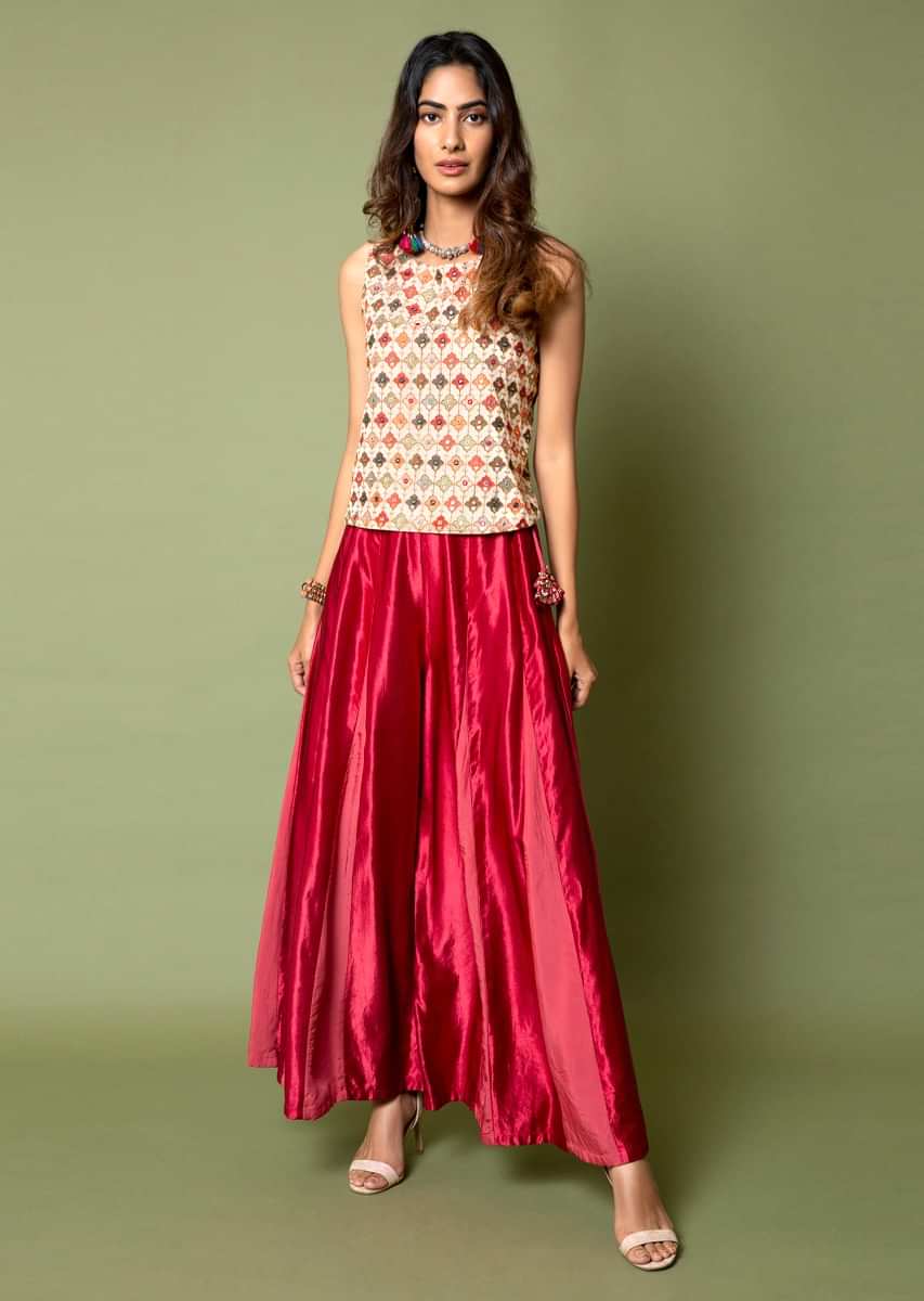 Ivory And Metallic Coral Top And Box Pleat Palazzo Set Adorned In Thread Embroidery And Tassel Detailing  