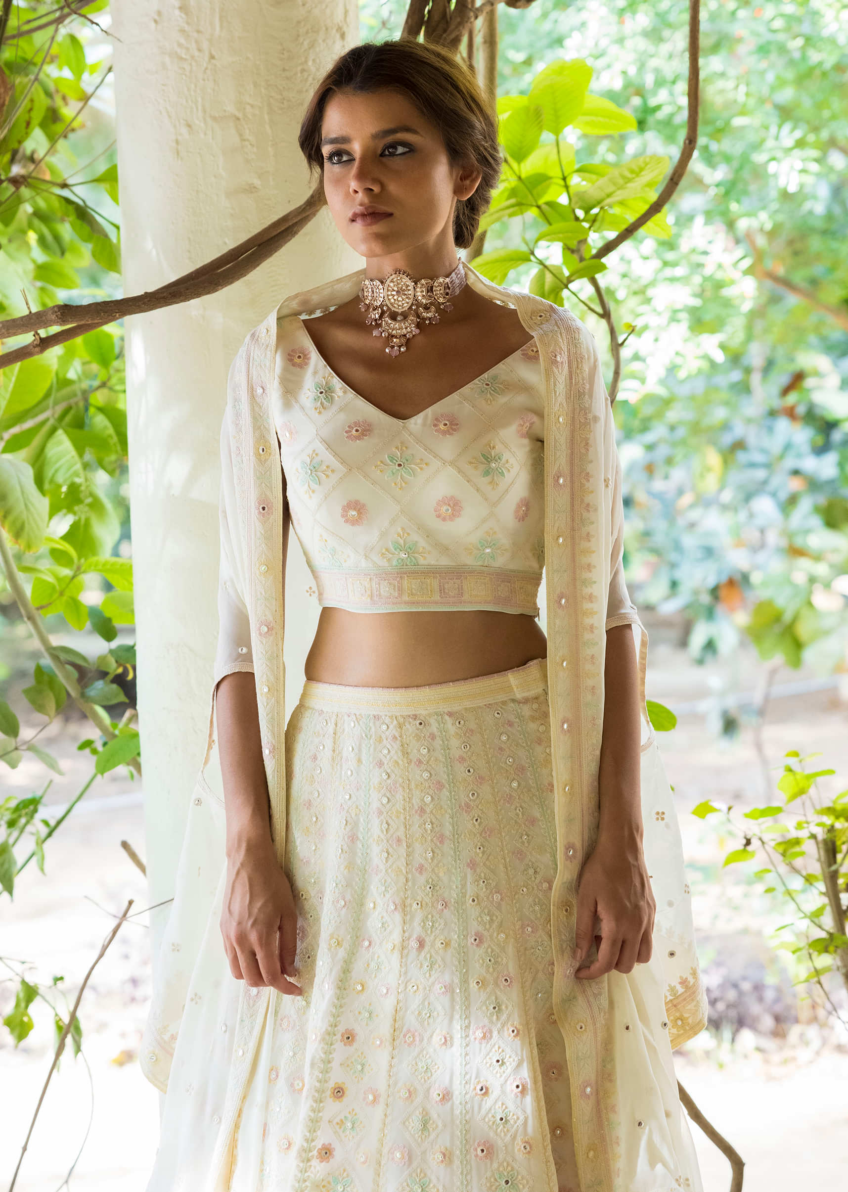 Ivory Lehenga Choli In Georgette With Lucknowi Embroidery In Geometric And Floral Motifs Online - Kalki Fashion