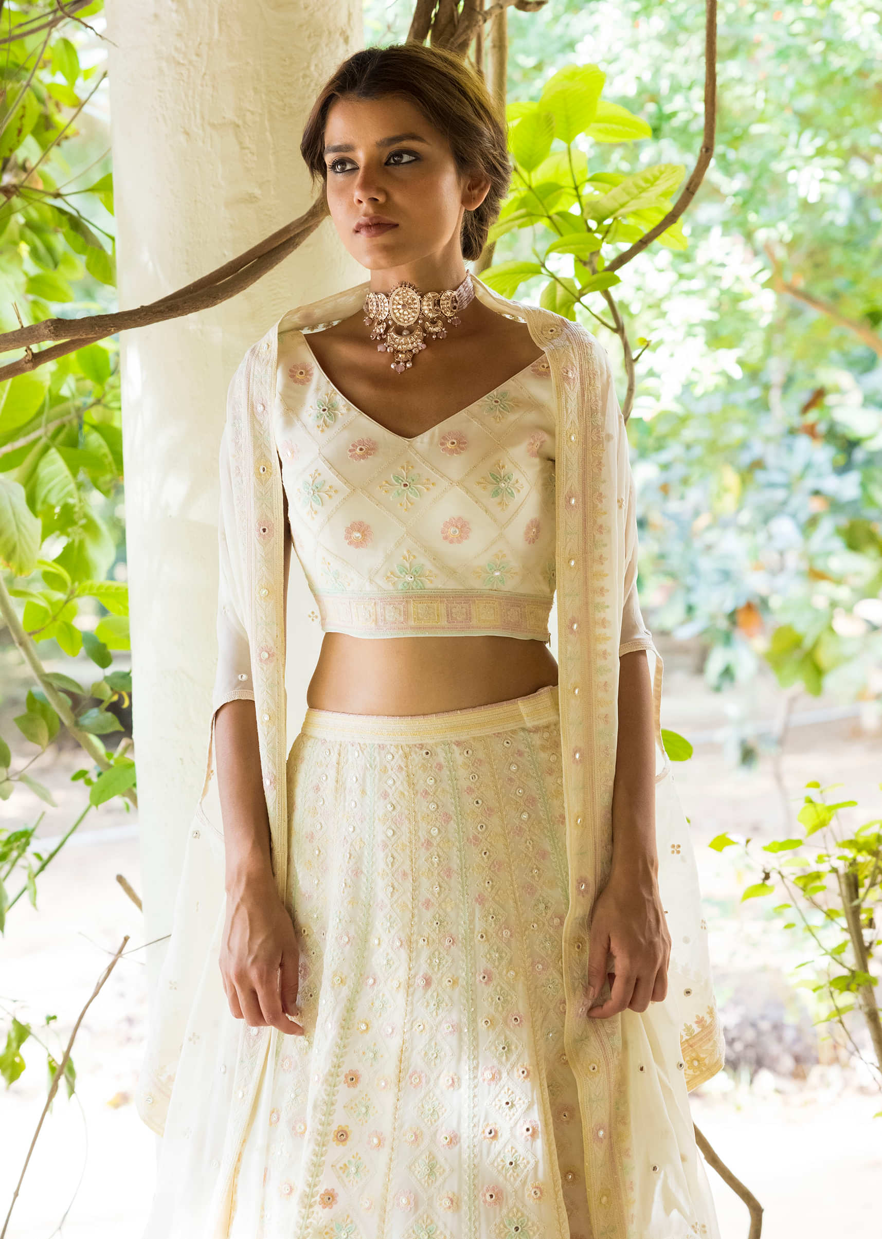 Ivory Lehenga Choli In Georgette With Lucknowi Embroidery In Geometric And Floral Motifs Online - Kalki Fashion