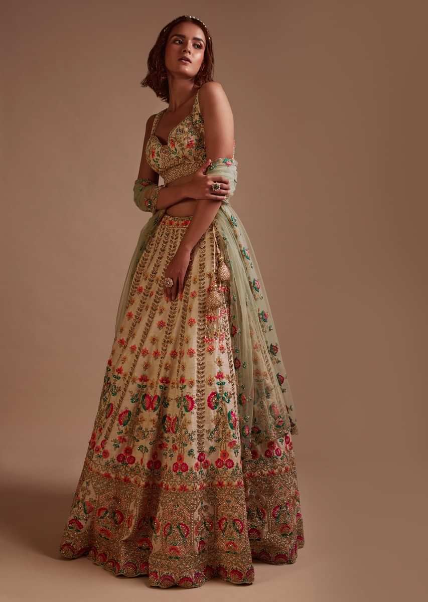 Ivory Lehenga Choli In Raw Silk With Colorful Resham Embroidered Floral Kalis  