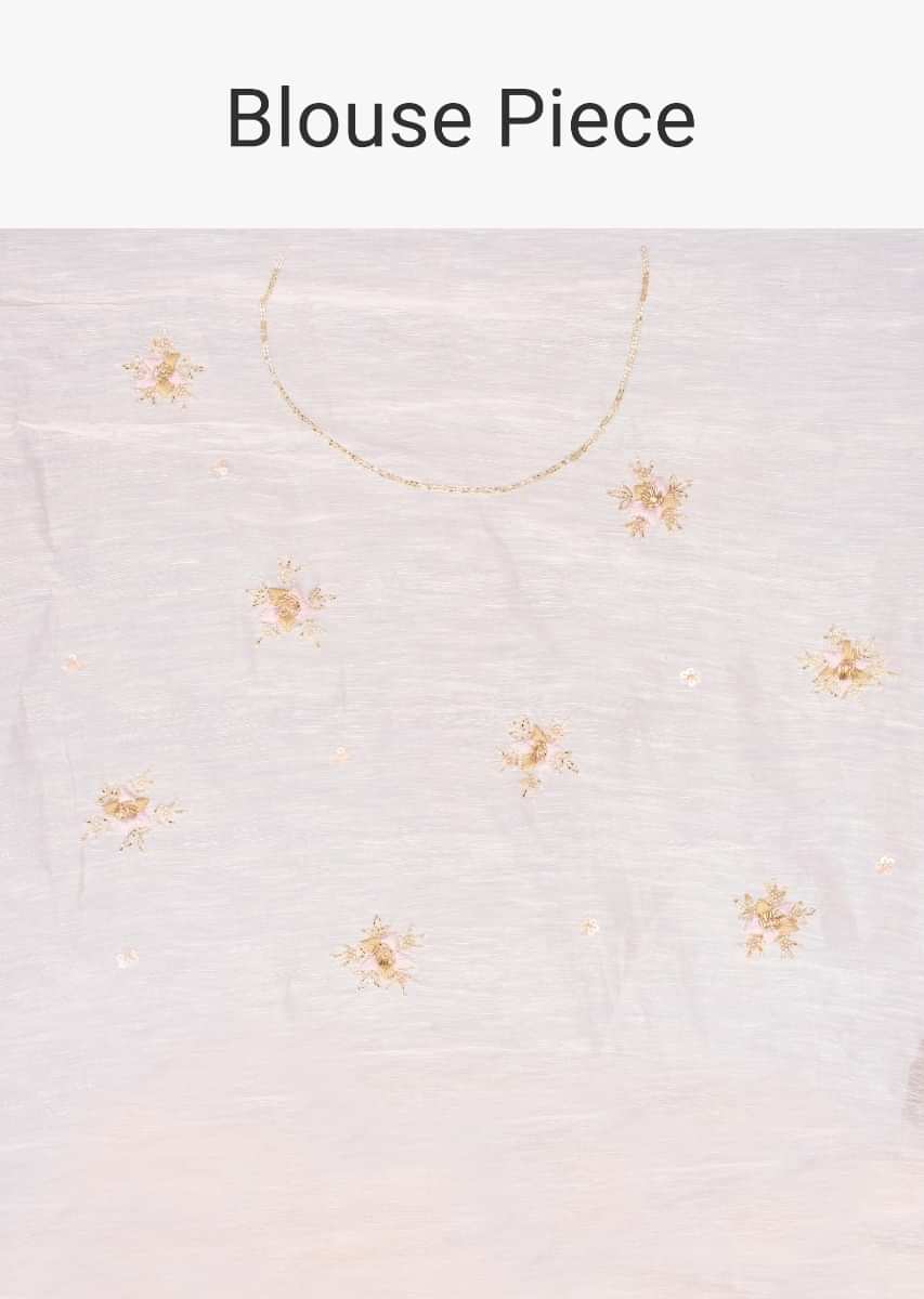 Ivory linen saree in floral jaal embroidery only on kalki