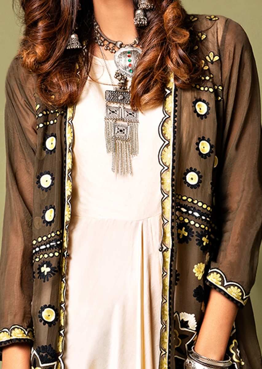 Ivory White Cowl Jumpsuit Paired With A Contrasting Olive Jacket Featuring Mandala Aari Embroidery  