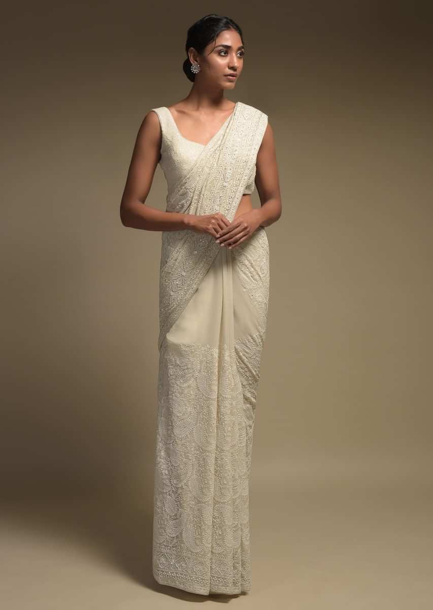 Ivory White Saree In Georgette Adorned With Lucknowi Thread Embroidery In Paisley Jaal